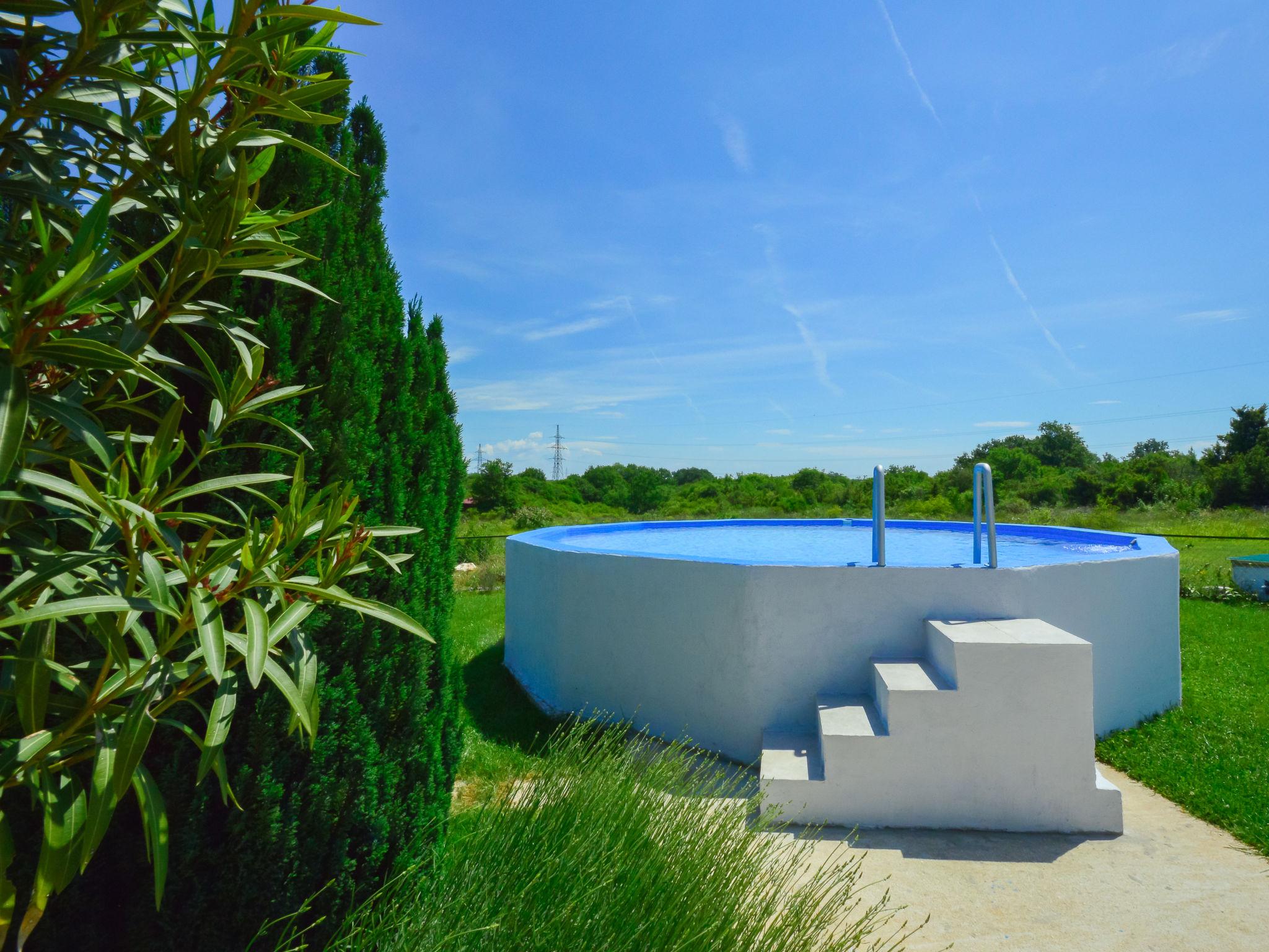 Photo 14 - Maison de 3 chambres à Pula avec piscine privée et vues à la mer