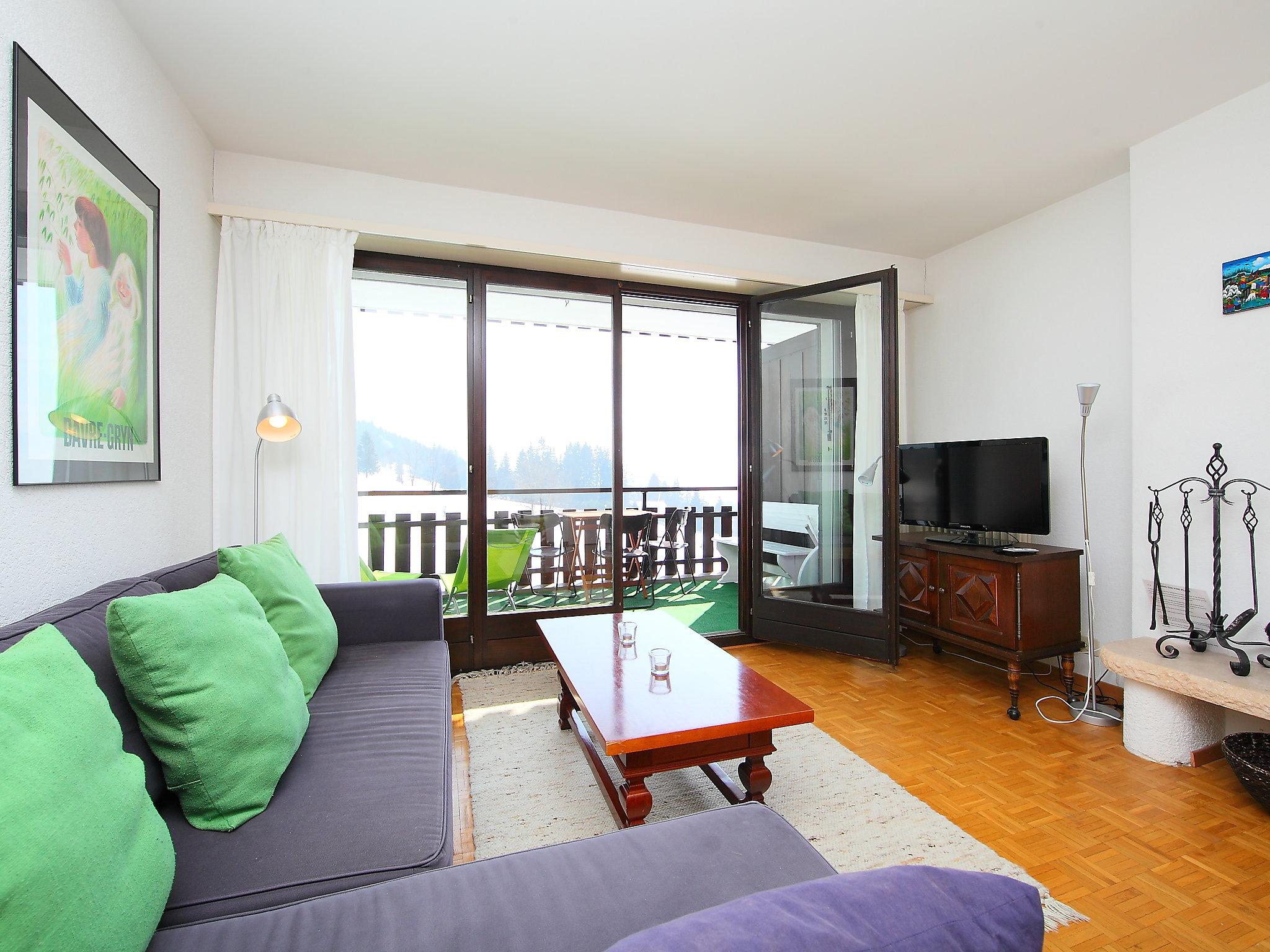 Foto 2 - Appartamento con 2 camere da letto a Ollon con sauna e vista sulle montagne