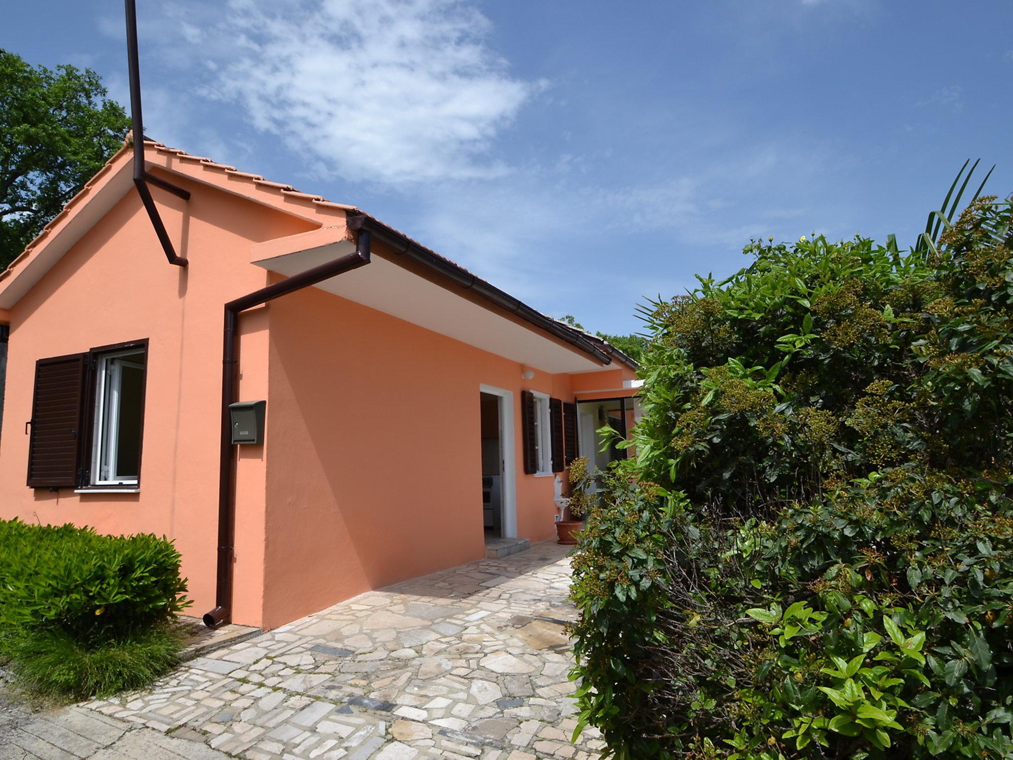 Photo 8 - Maison de 1 chambre à Opatija avec jardin et vues à la mer