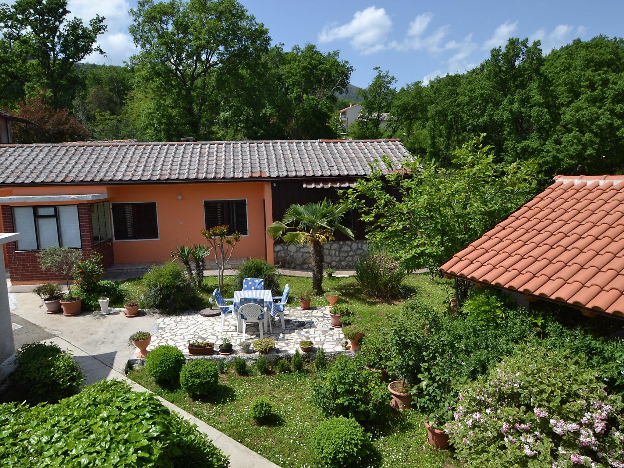 Photo 1 - Maison de 1 chambre à Opatija avec jardin et vues à la mer