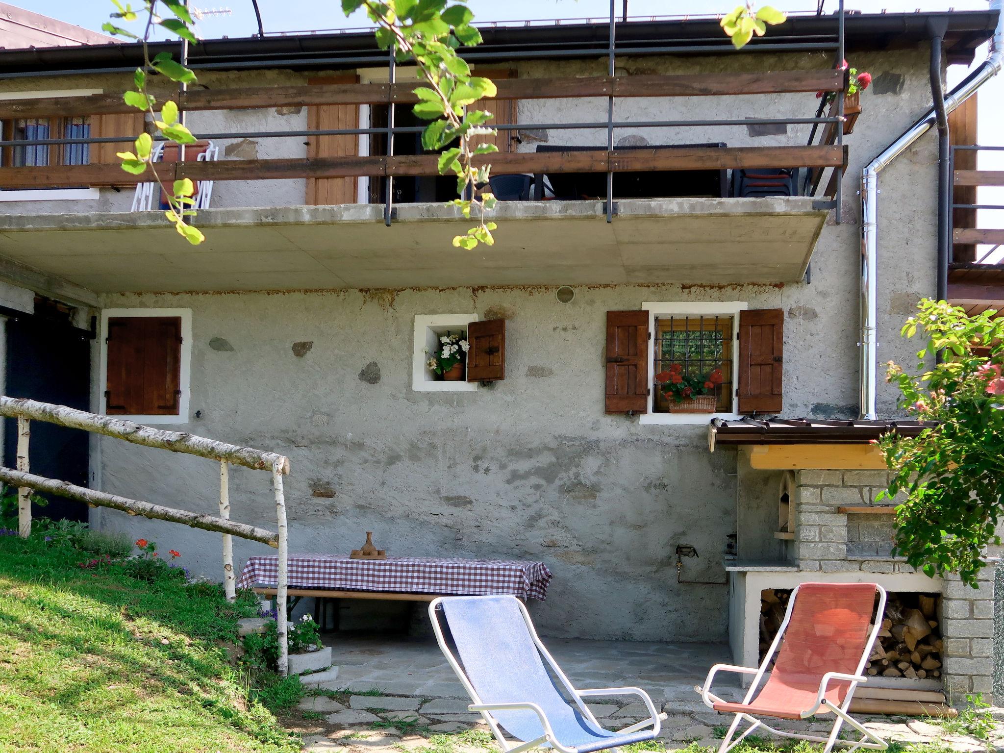 Photo 27 - Appartement de 3 chambres à Peglio avec jardin et vues sur la montagne