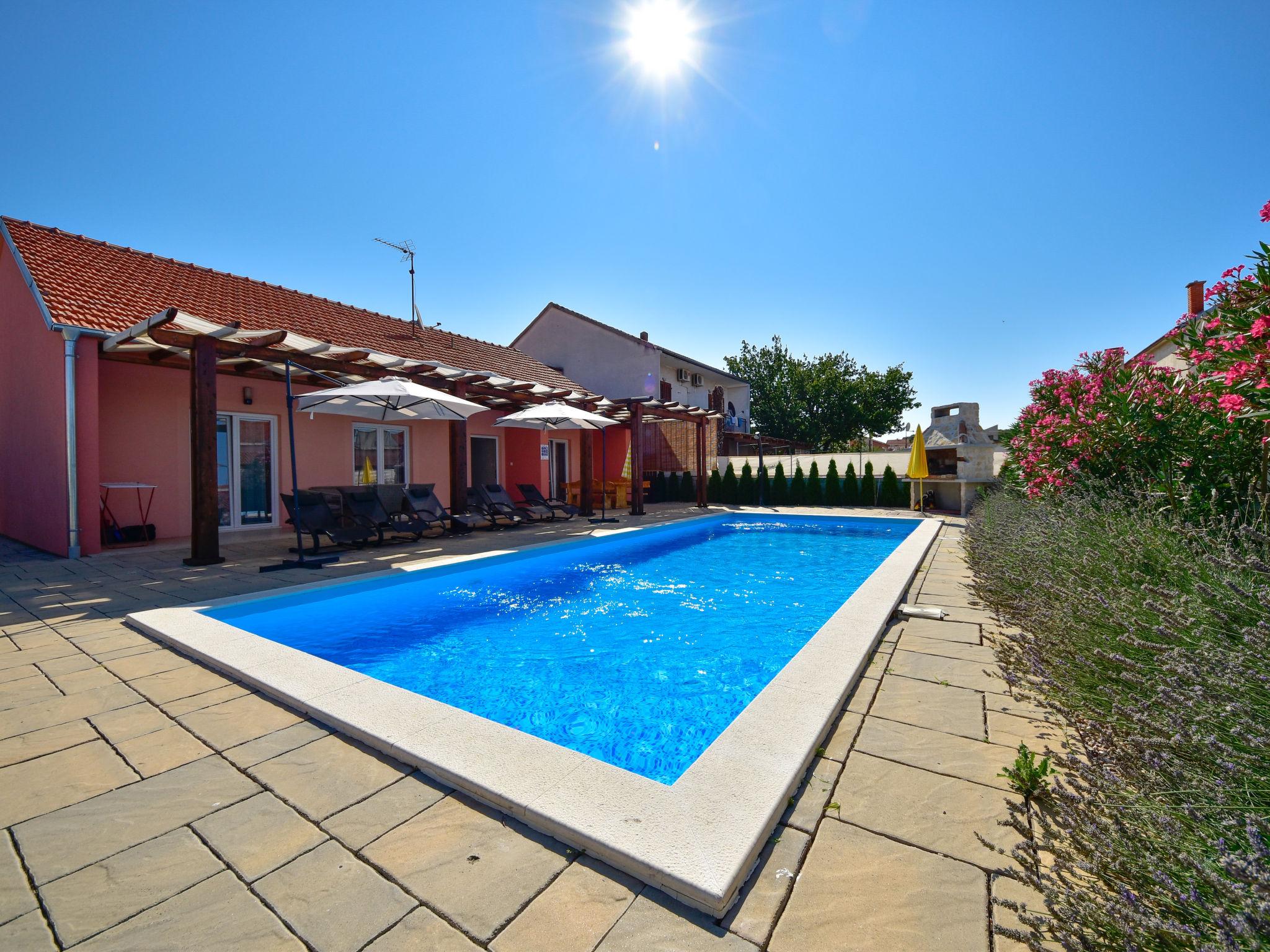 Photo 23 - Maison de 3 chambres à Biograd na Moru avec piscine privée et vues à la mer