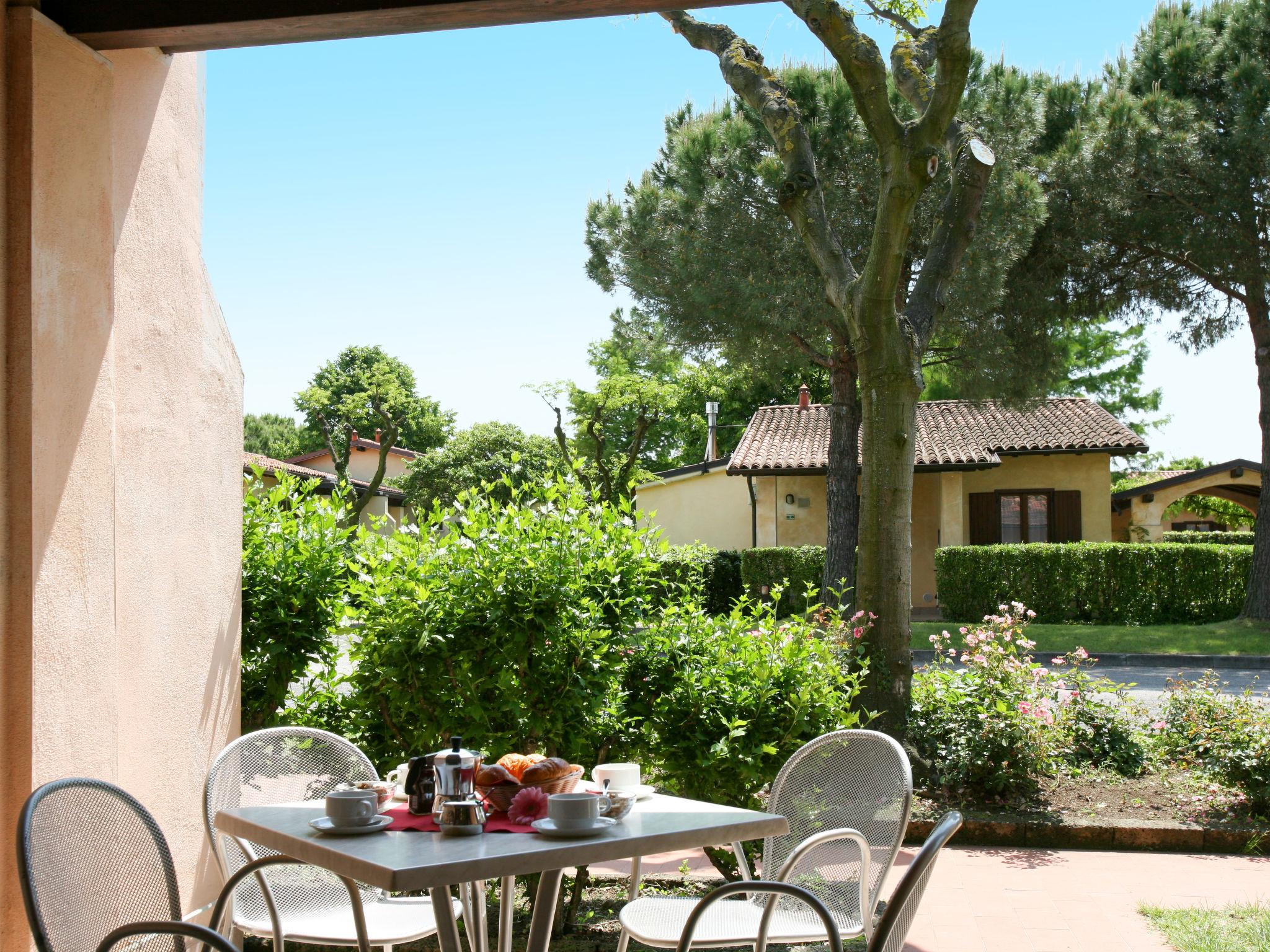 Photo 4 - Maison de 1 chambre à Sirmione avec piscine et jardin