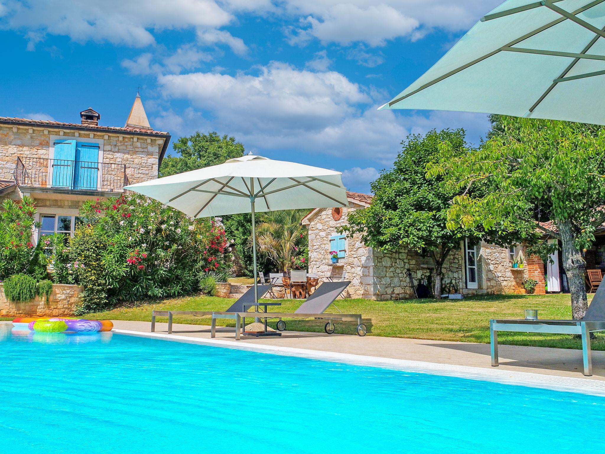 Photo 1 - Maison de 1 chambre à Kaštelir-Labinci avec piscine et vues à la mer