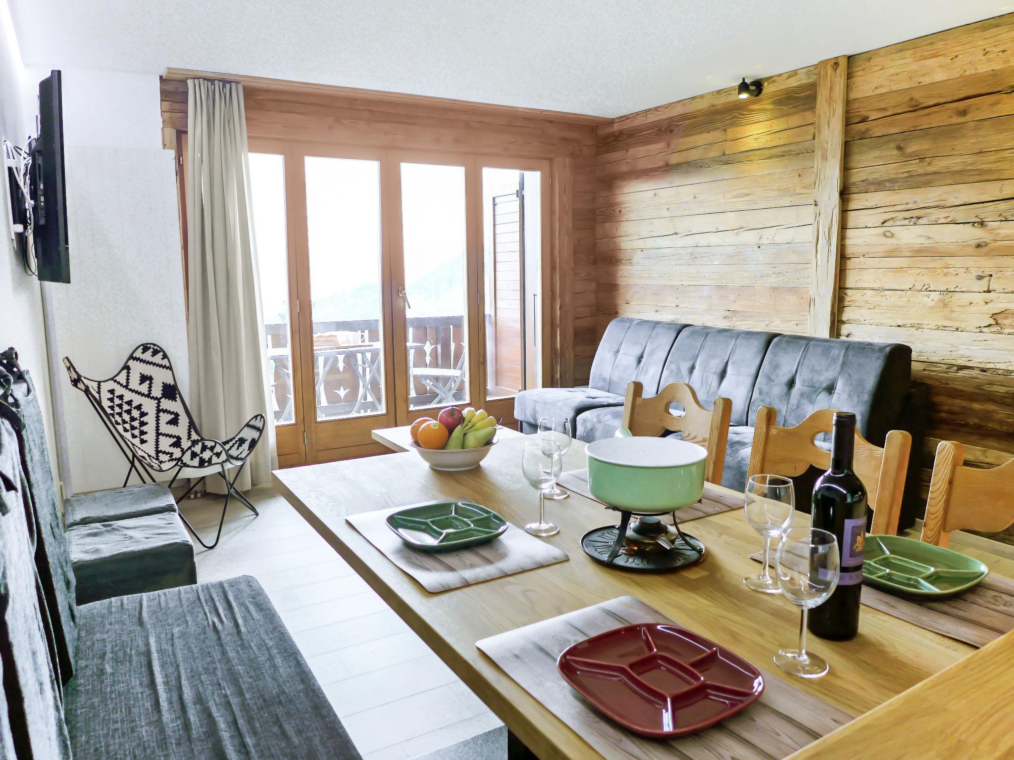 Photo 1 - Appartement de 2 chambres à Ollon avec sauna et vues sur la montagne