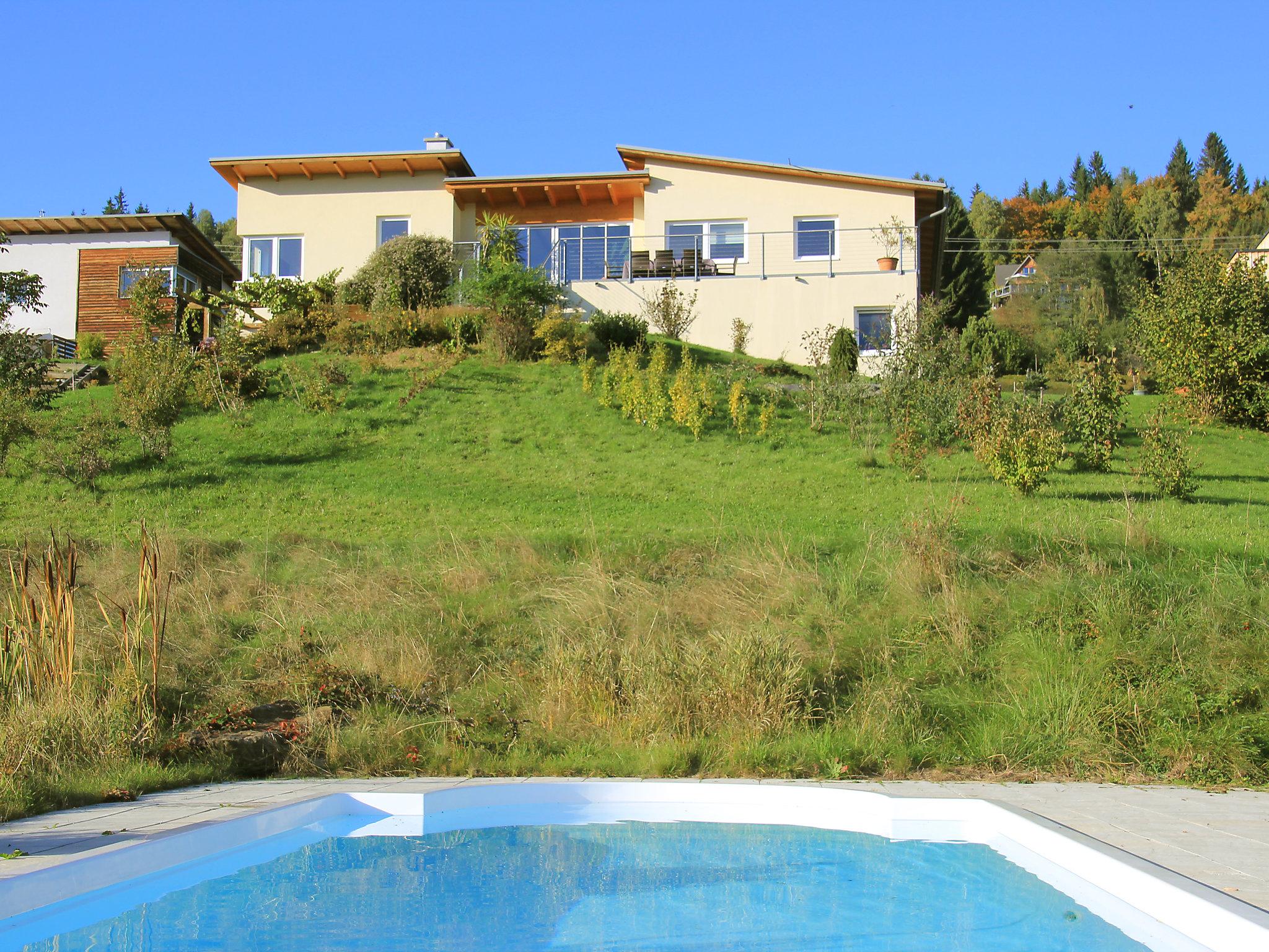 Foto 1 - Casa de 5 habitaciones en Velden am Wörther See con piscina privada y vistas a la montaña