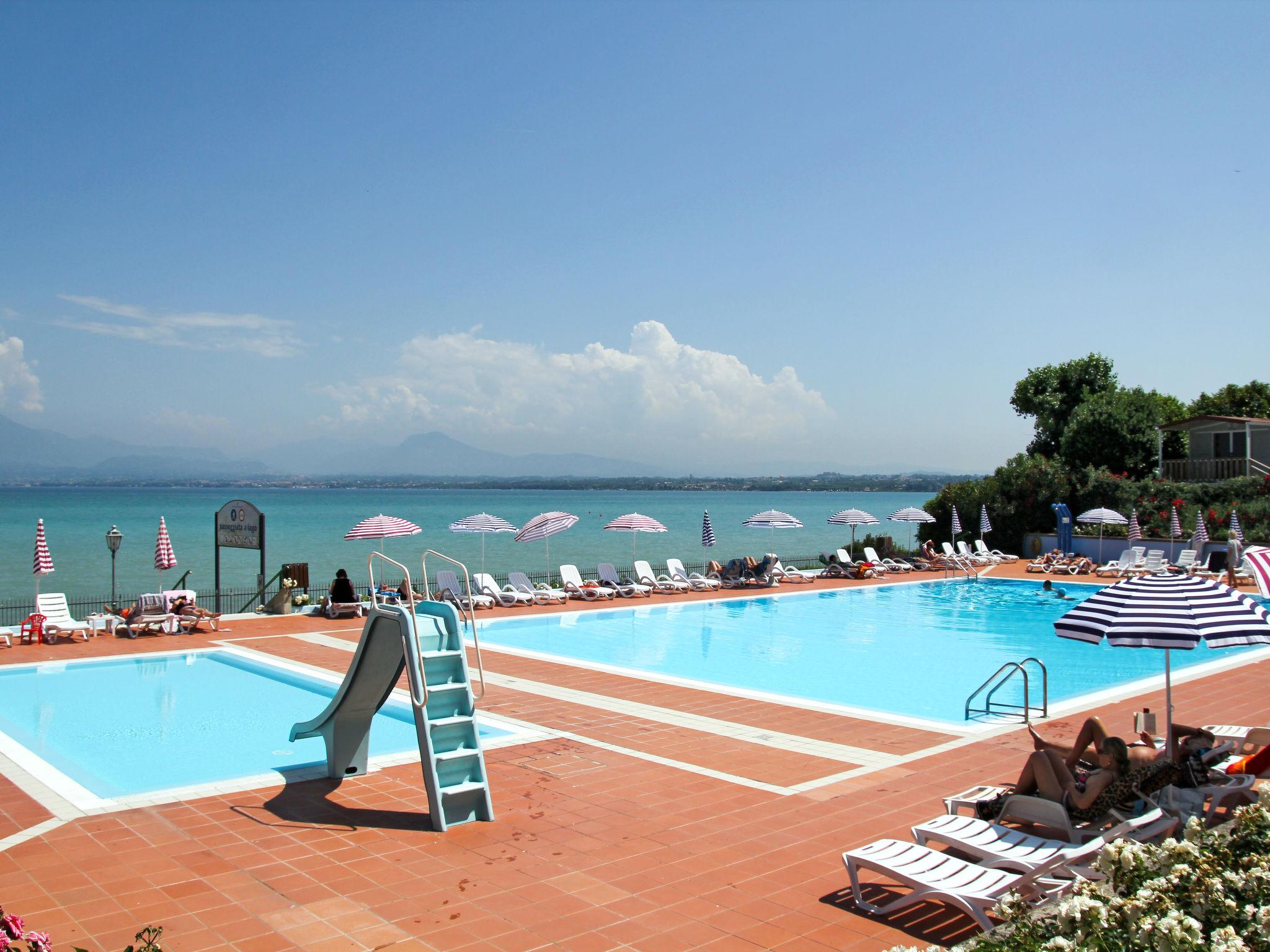 Foto 1 - Casa con 2 camere da letto a Peschiera del Garda con piscina e vista sulle montagne