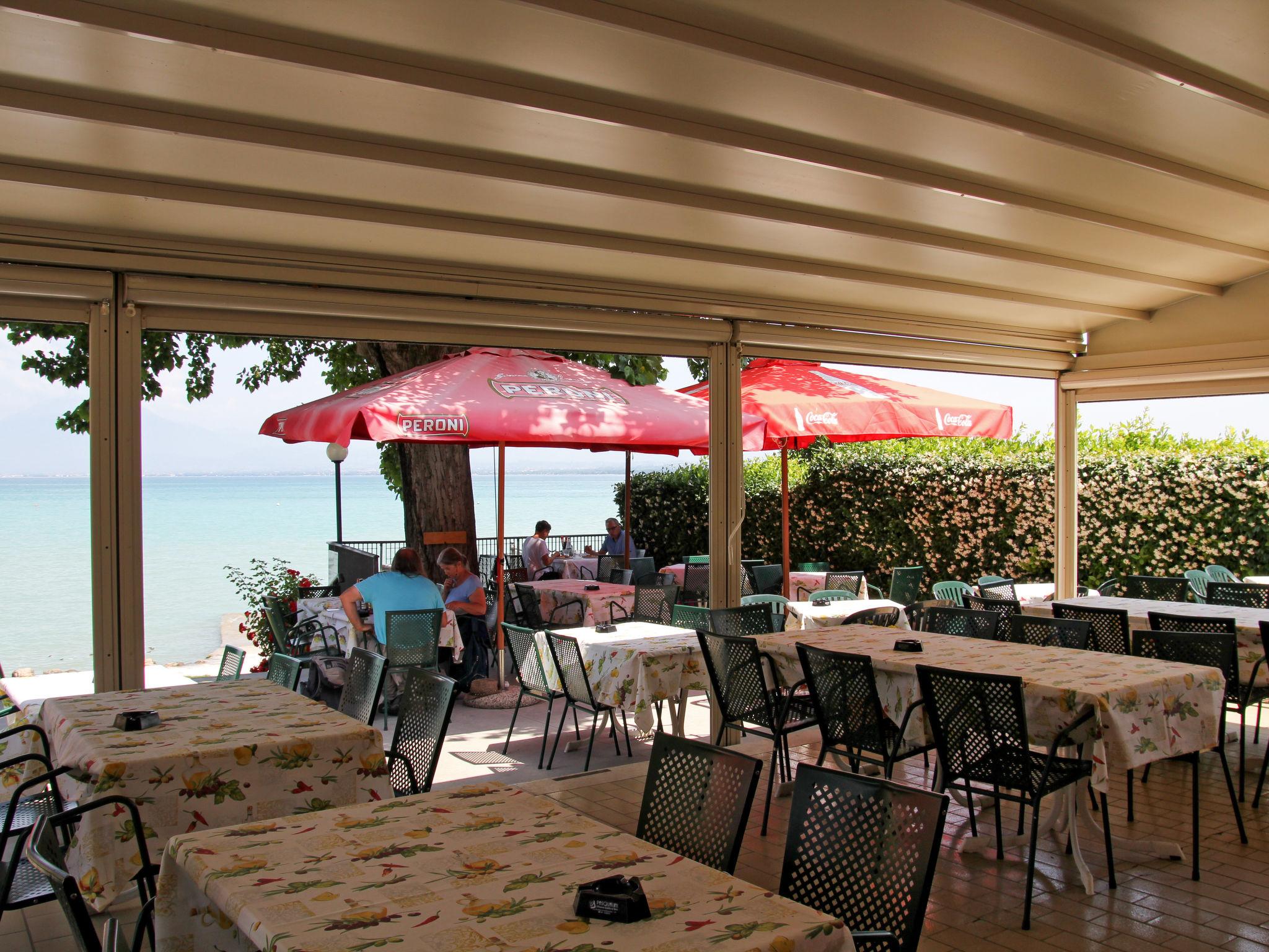 Photo 5 - Maison de 2 chambres à Peschiera del Garda avec piscine et jardin