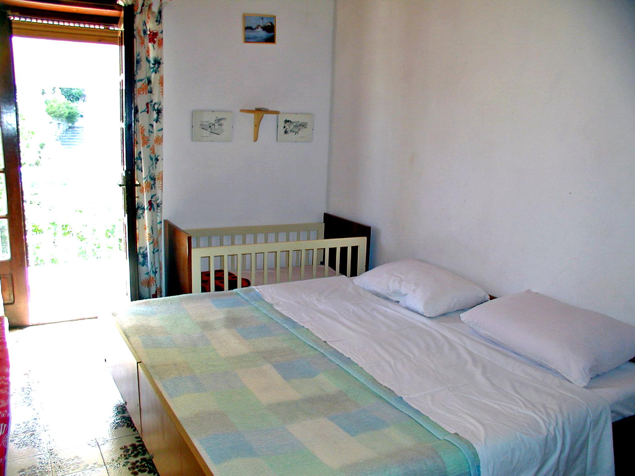 Foto 5 - Apartamento de 2 habitaciones en Kali con piscina y vistas al mar