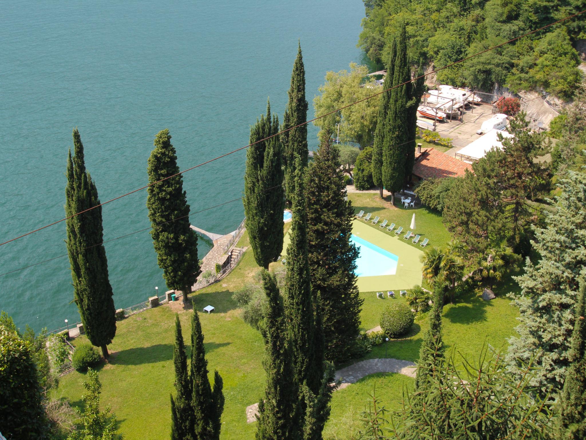 Foto 1 - Apartamento en Faggeto Lario con piscina y jardín