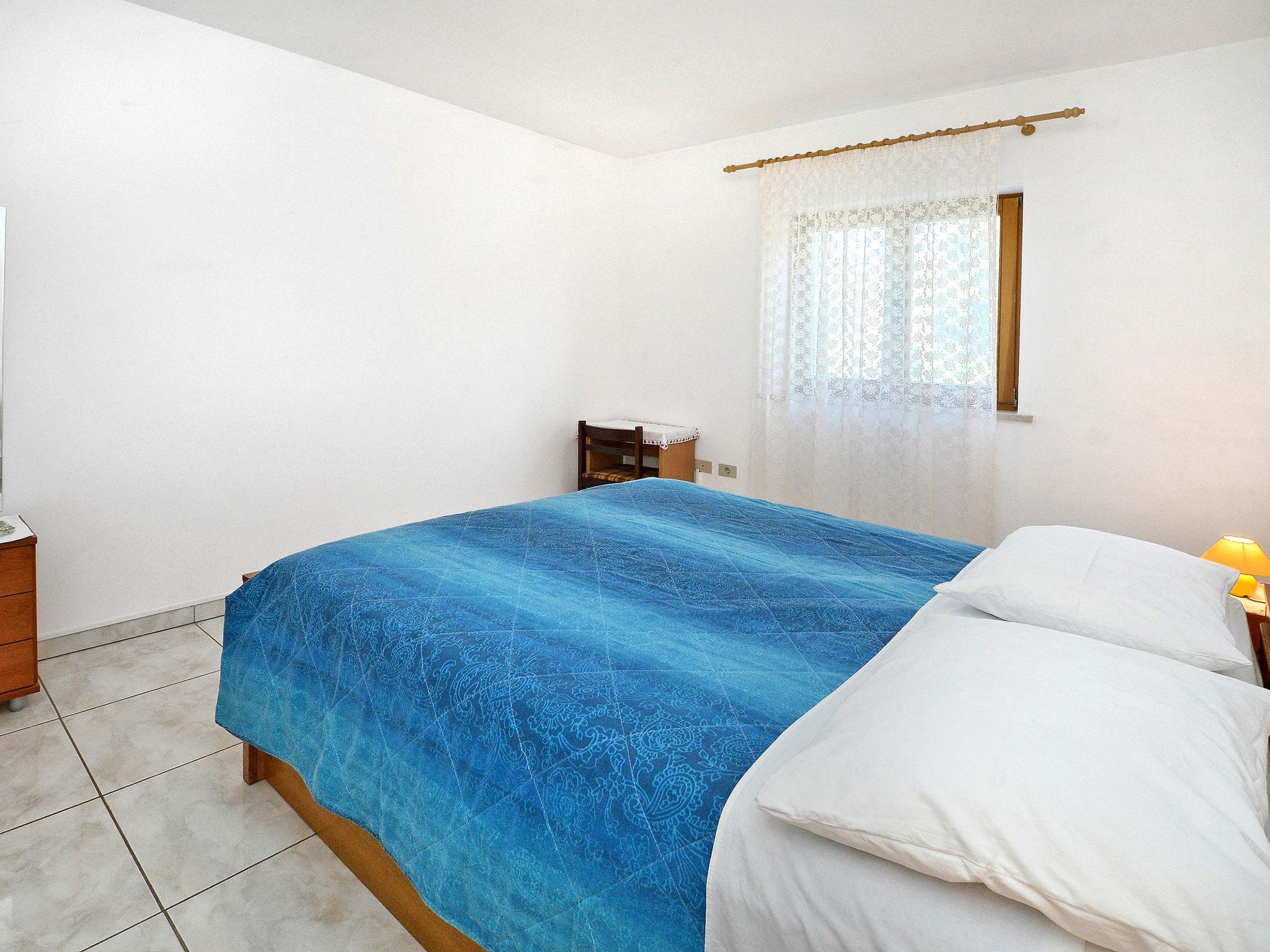 Foto 9 - Appartamento con 1 camera da letto a Umag con piscina e giardino