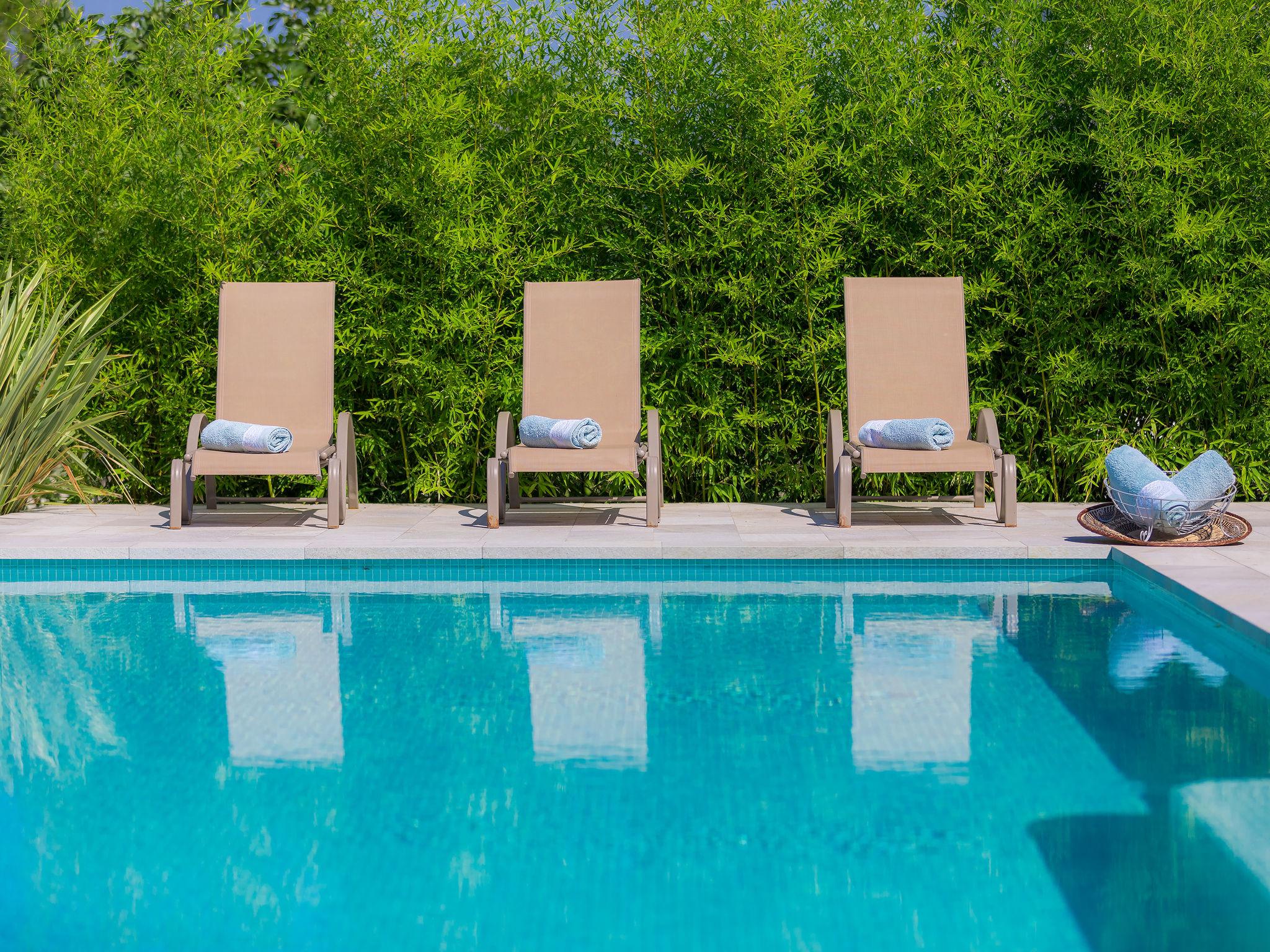 Photo 5 - Maison de 5 chambres à Pula avec piscine privée et jardin