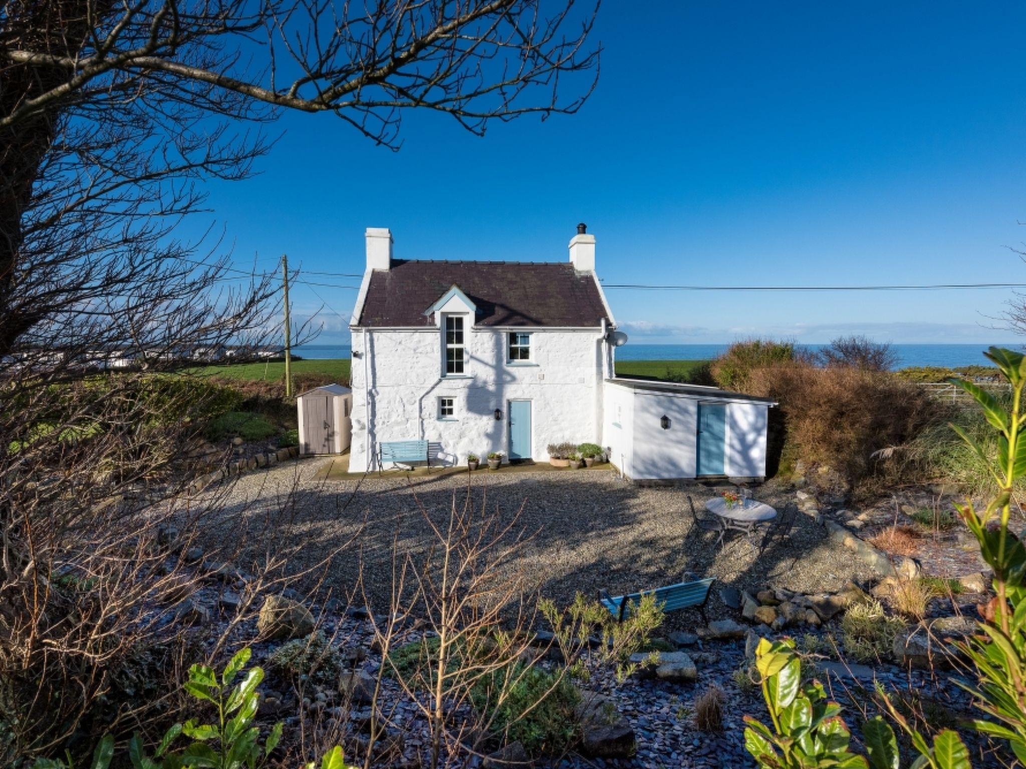 Foto 1 - Casa de 2 habitaciones en Pwllheli con jardín y vistas al mar