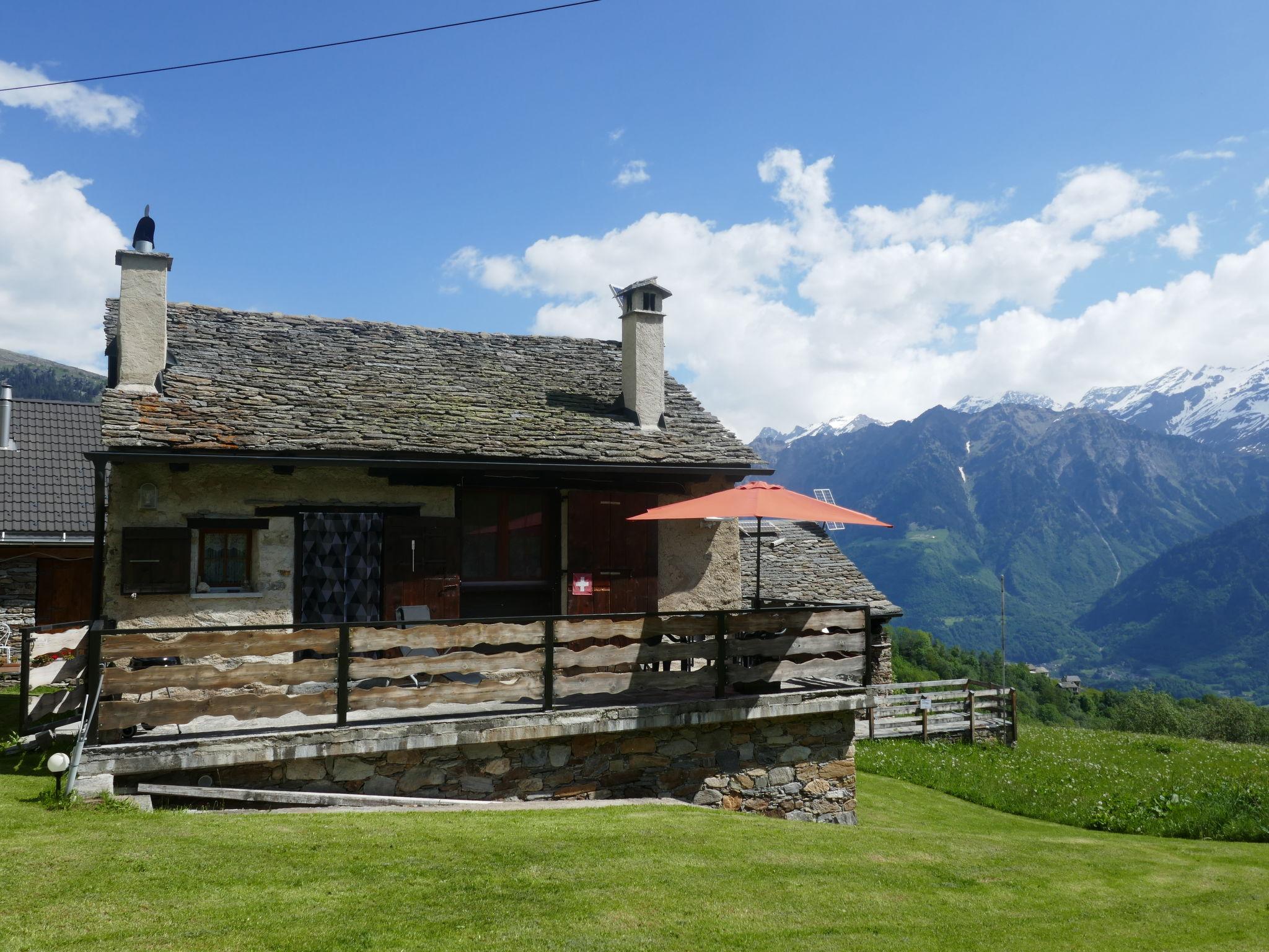 Foto 6 - Casa a Acquarossa con terrazza e vista sulle montagne