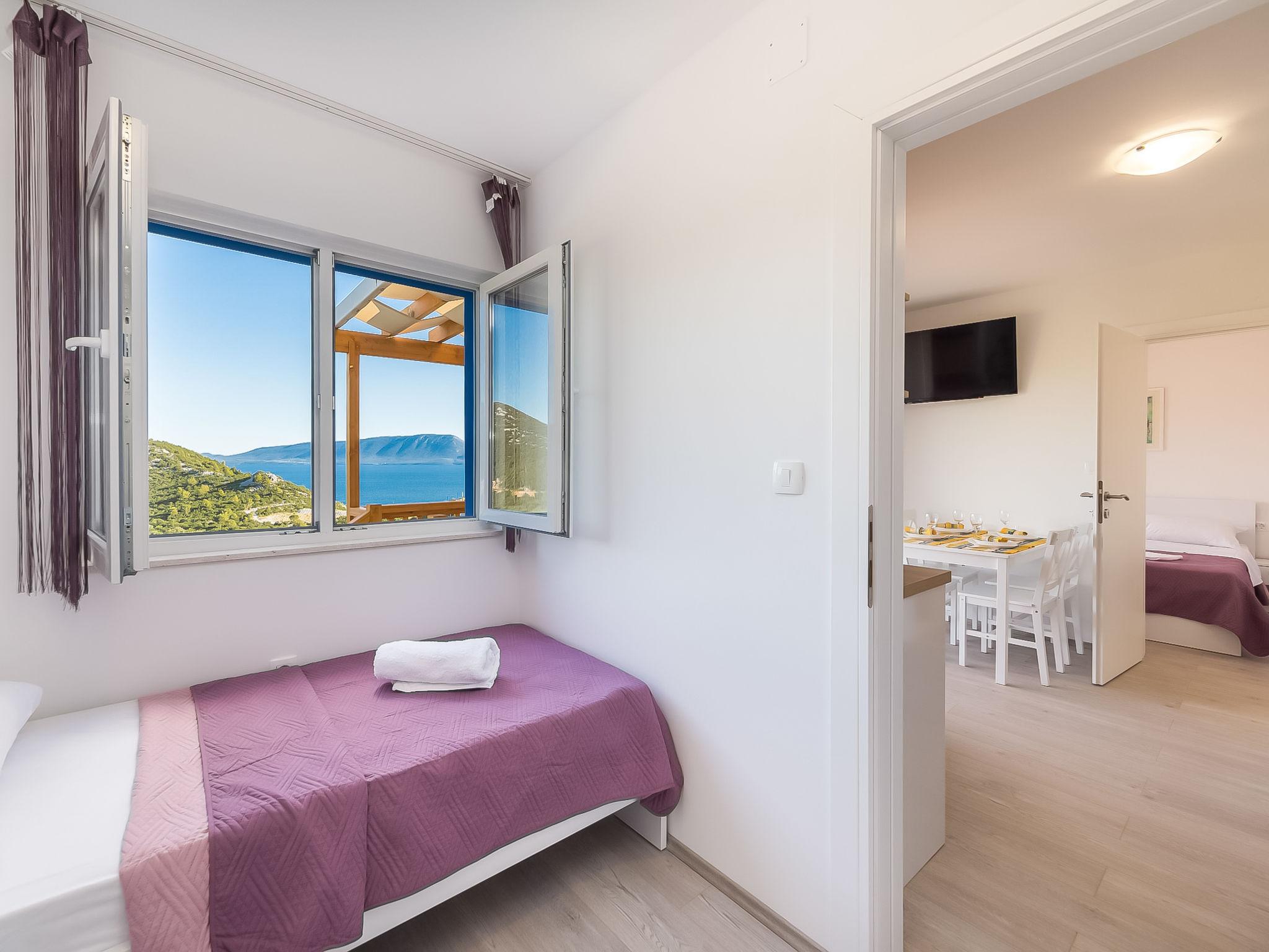 Foto 2 - Casa con 2 camere da letto a Ploče con piscina e vista mare