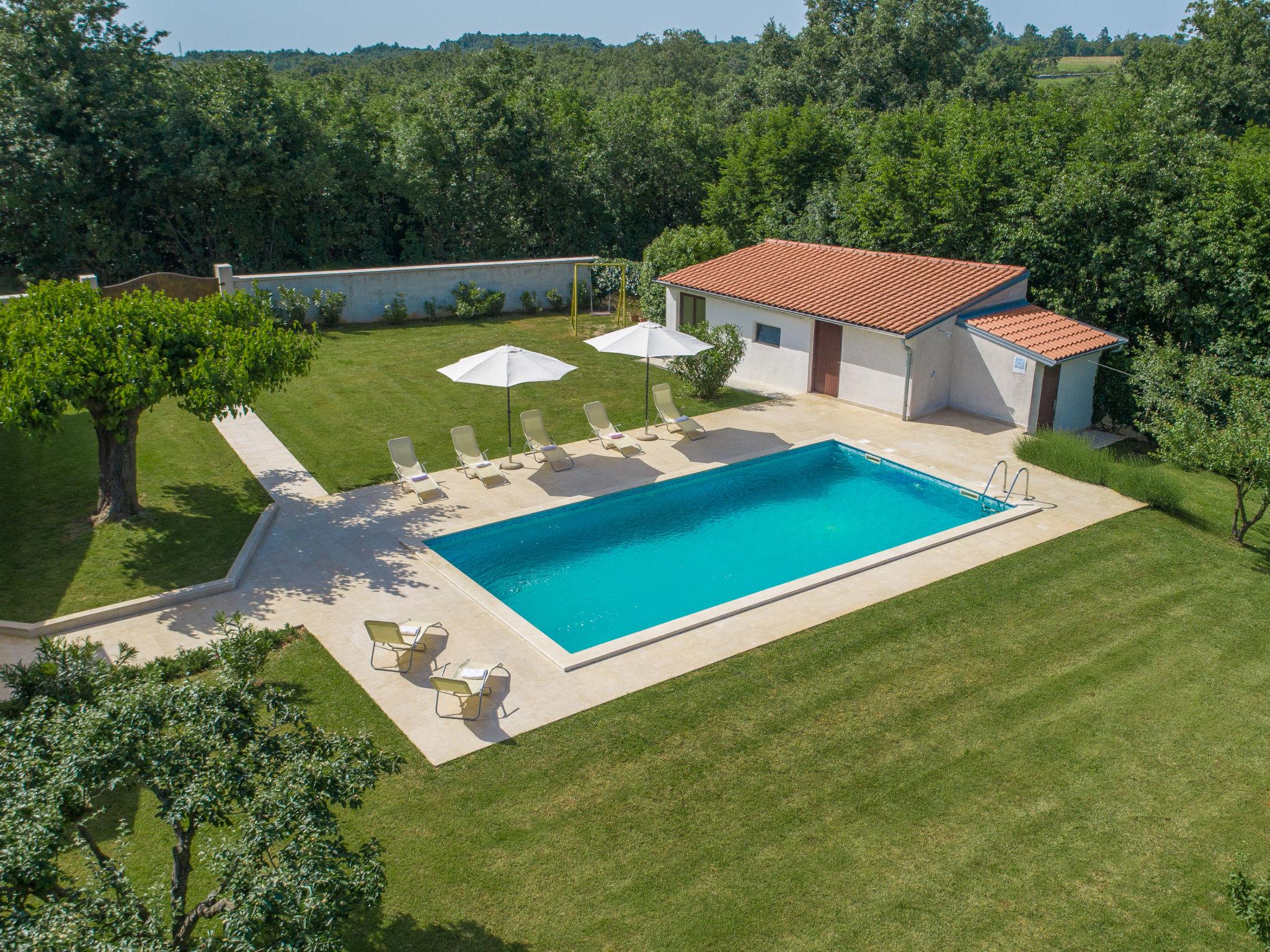 Foto 20 - Casa con 4 camere da letto a Žminj con piscina privata e vista mare