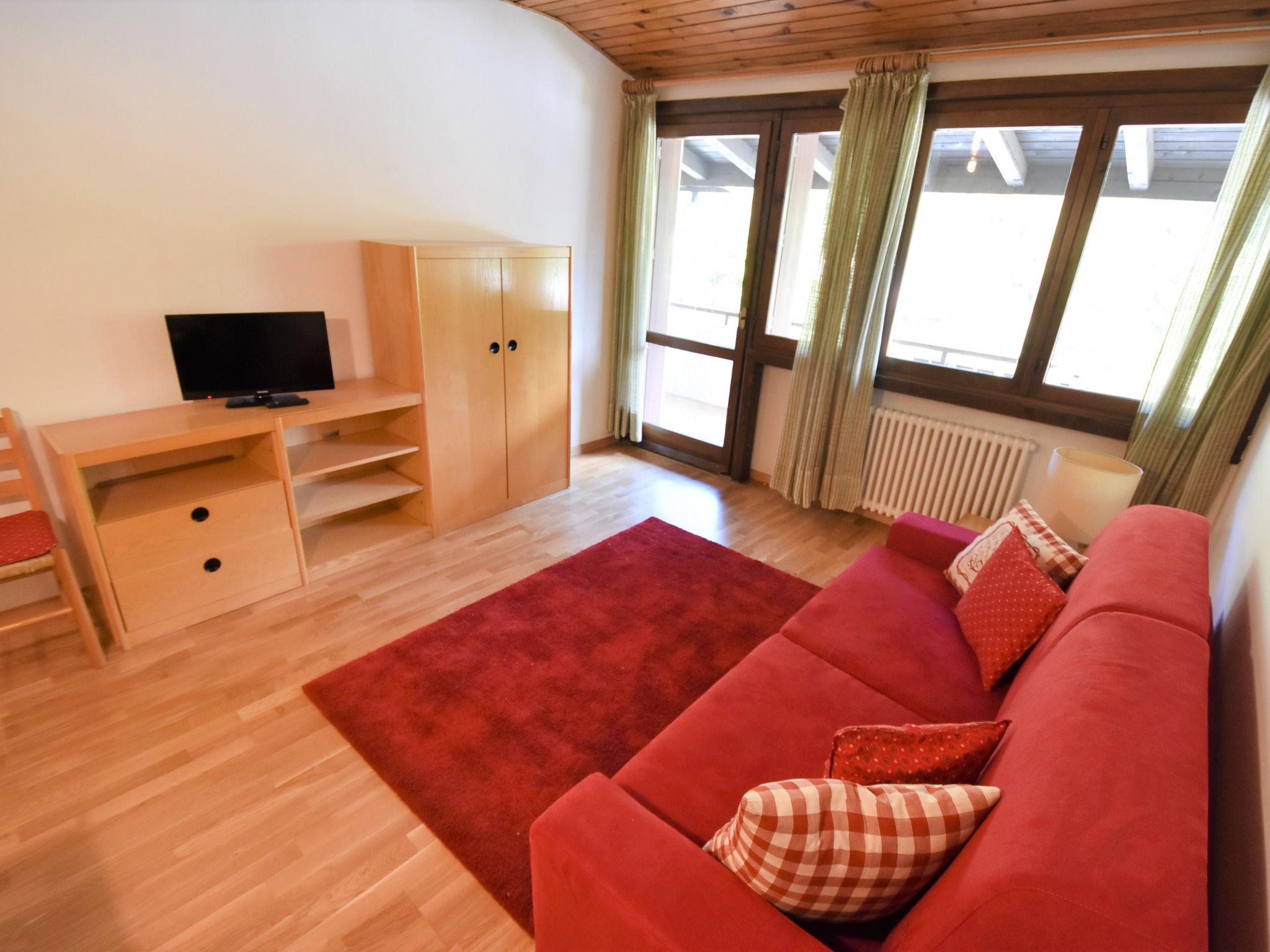 Foto 6 - Apartamento de 1 habitación en Pinzolo con jardín y vistas a la montaña