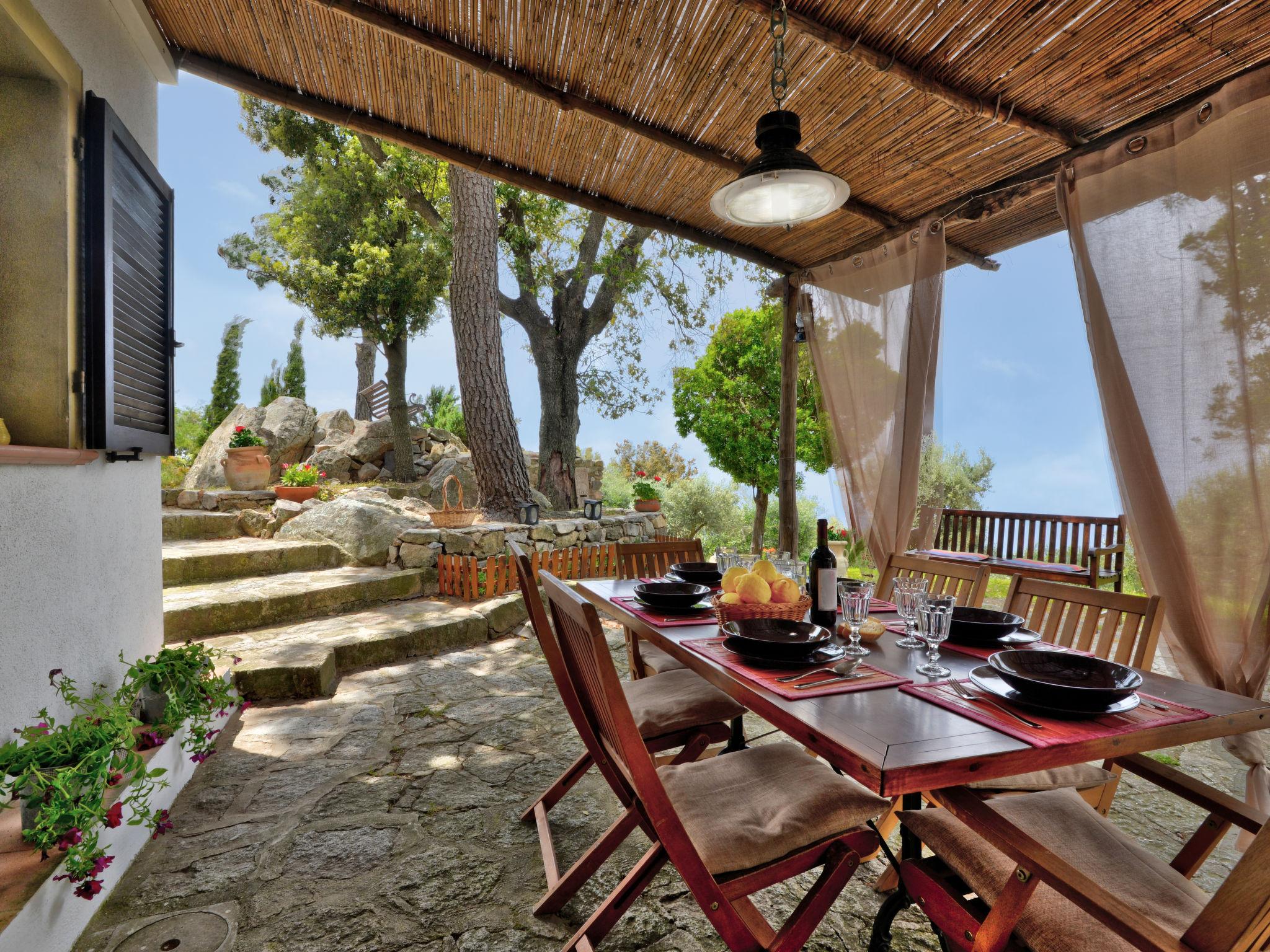 Photo 2 - Maison de 3 chambres à Marciana avec piscine privée et vues à la mer