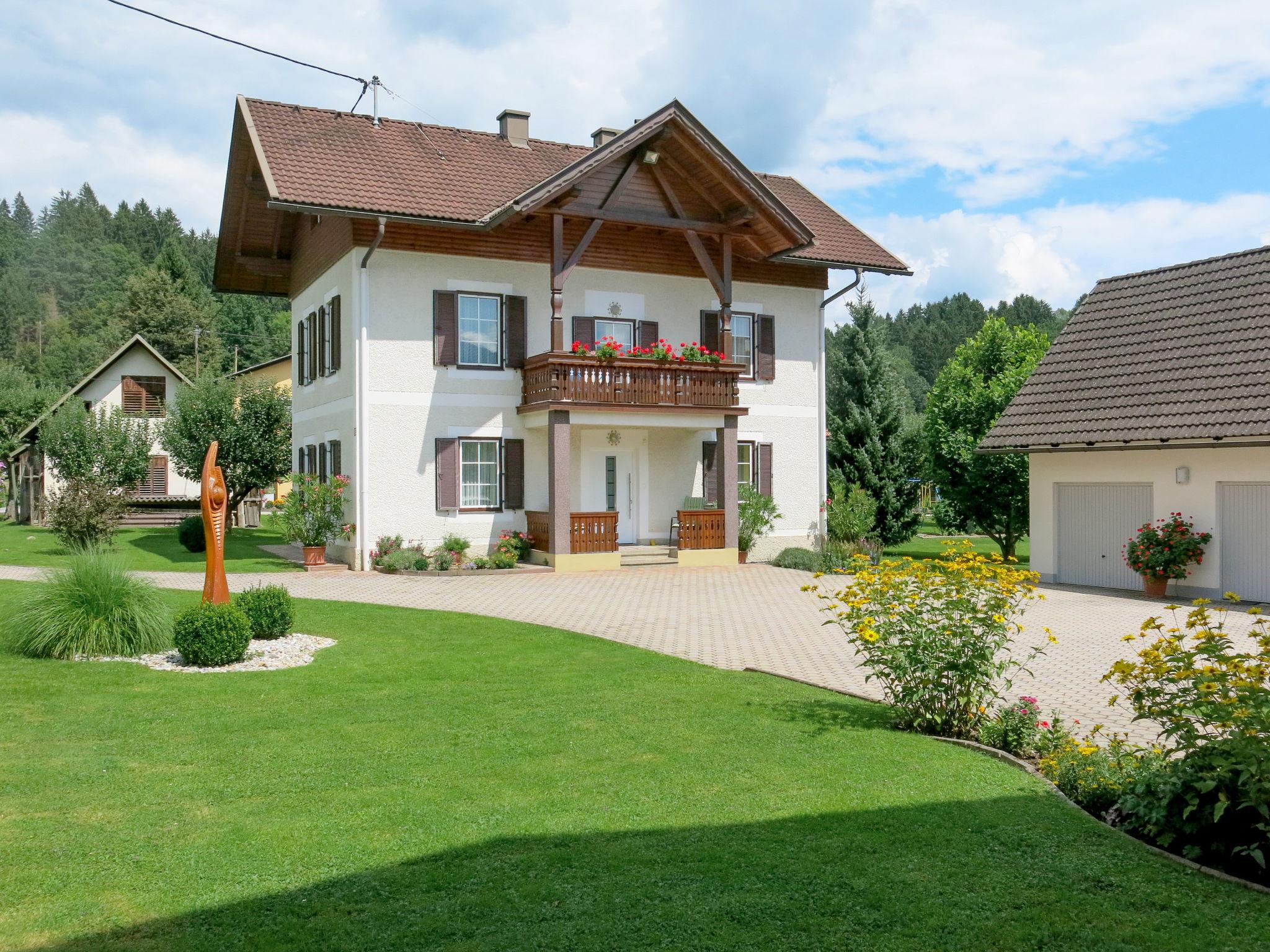 Foto 1 - Casa con 3 camere da letto a Velden am Wörther See con giardino e vista sulle montagne
