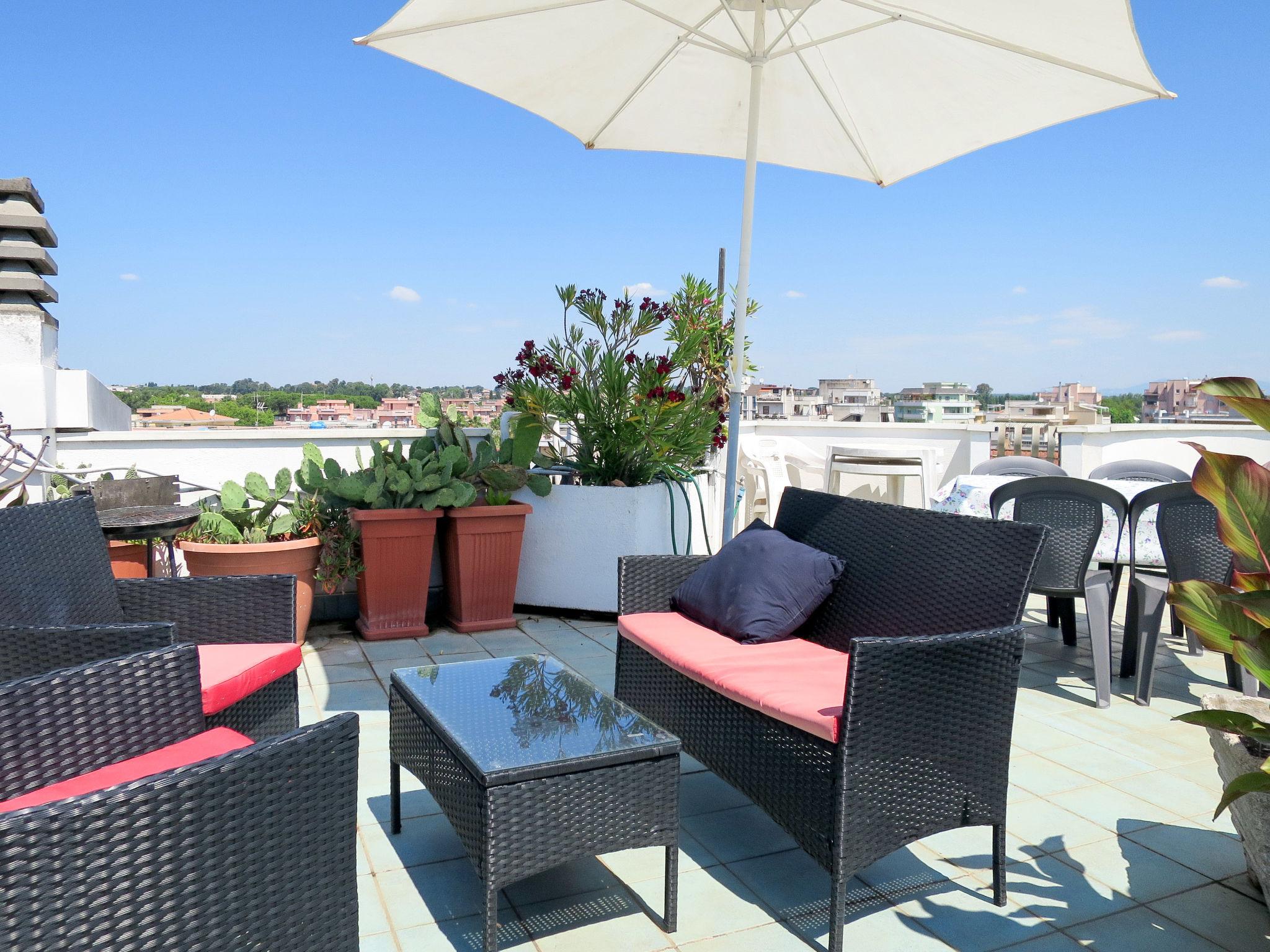 Photo 2 - Maison de 4 chambres à Nettuno avec jardin et terrasse