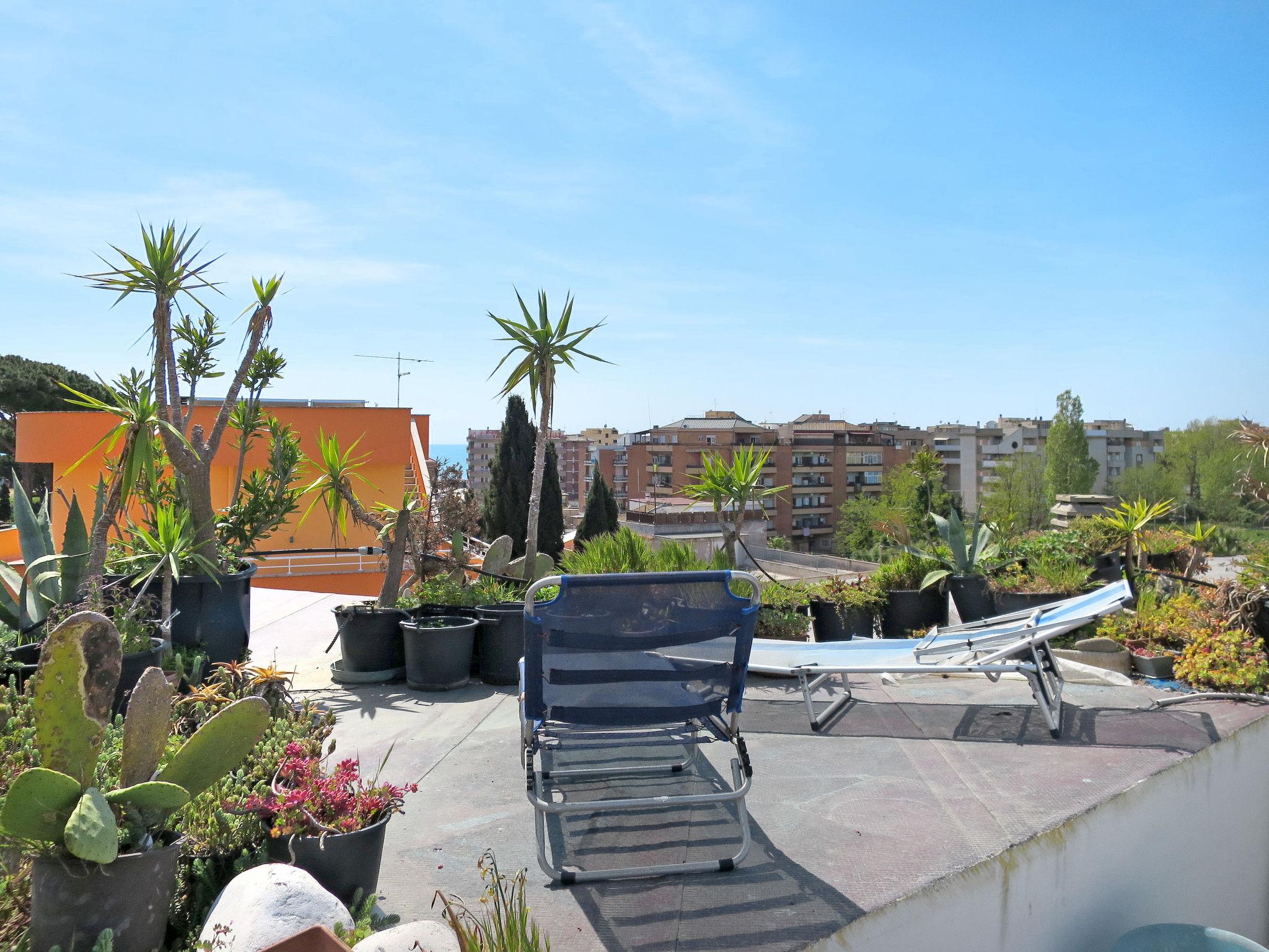 Photo 31 - Maison de 4 chambres à Nettuno avec jardin et terrasse