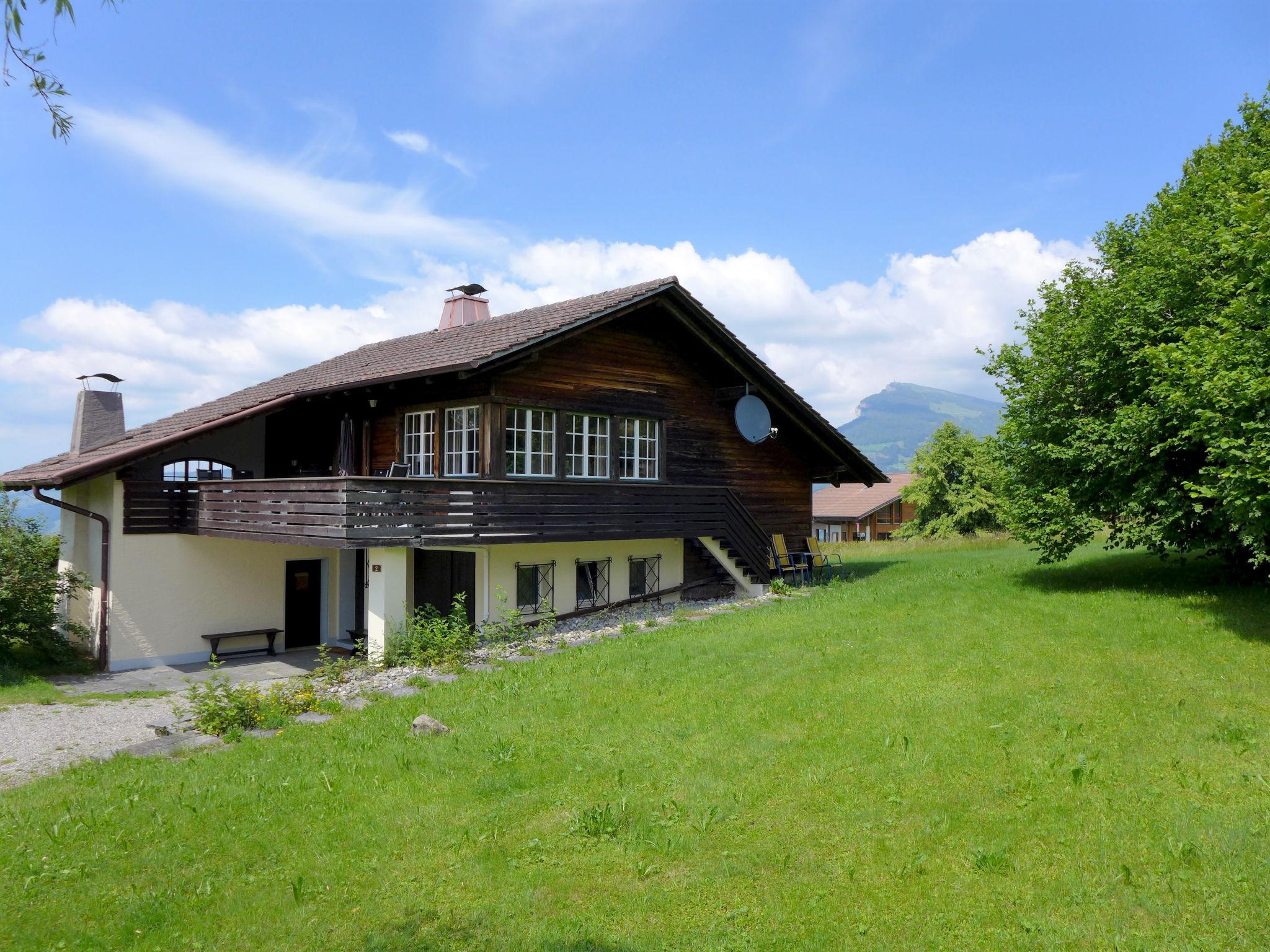 Photo 1 - Maison de 3 chambres à Aeschi bei Spiez avec jardin et vues sur la montagne