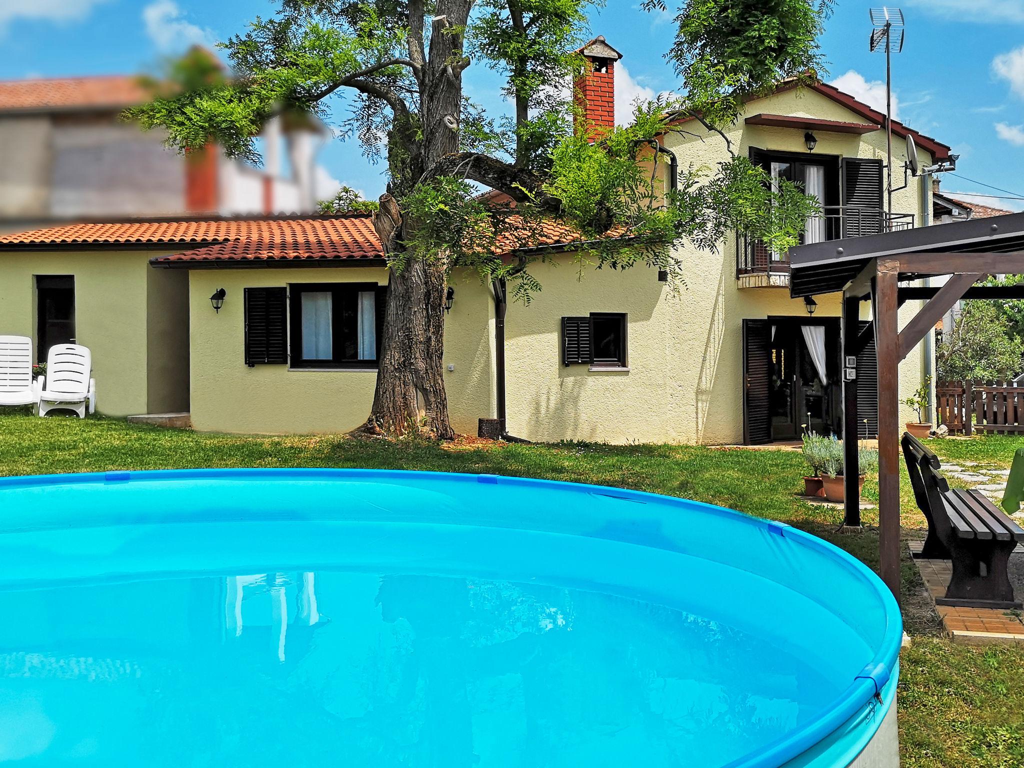 Foto 1 - Casa con 3 camere da letto a Poreč con piscina privata e vista mare