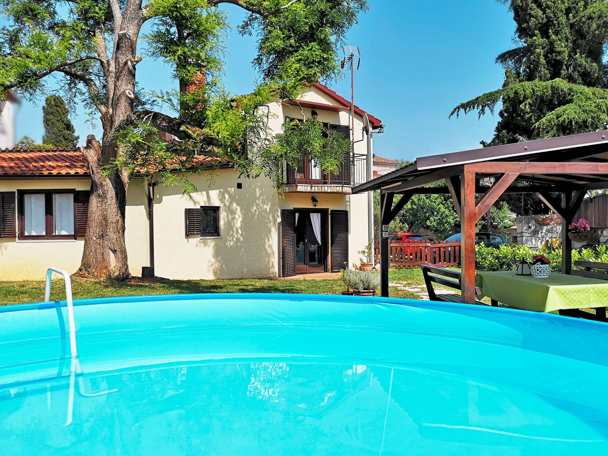 Foto 8 - Casa con 3 camere da letto a Poreč con piscina privata e vista mare