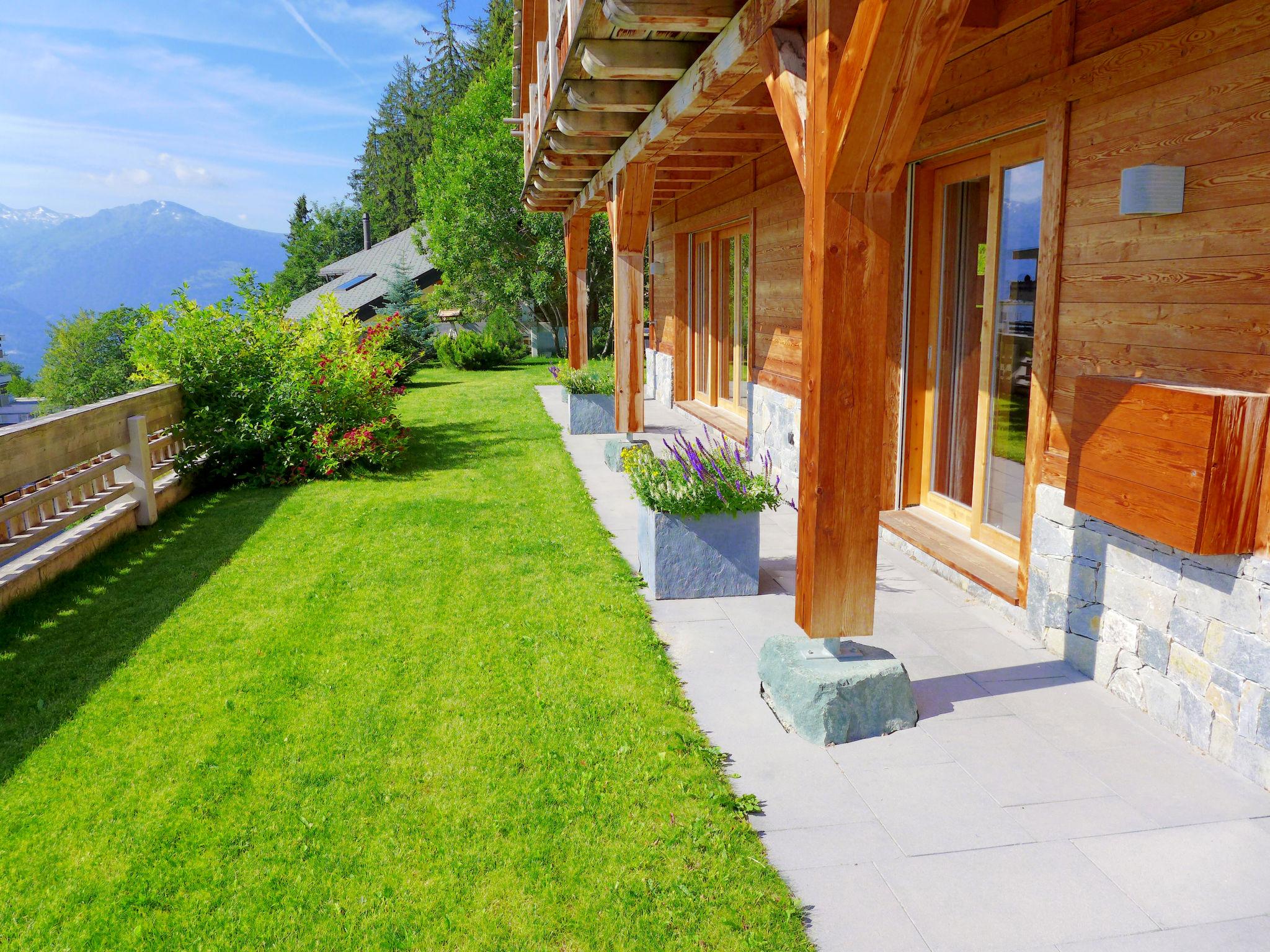 Foto 51 - Casa de 5 habitaciones en Crans-Montana con jardín