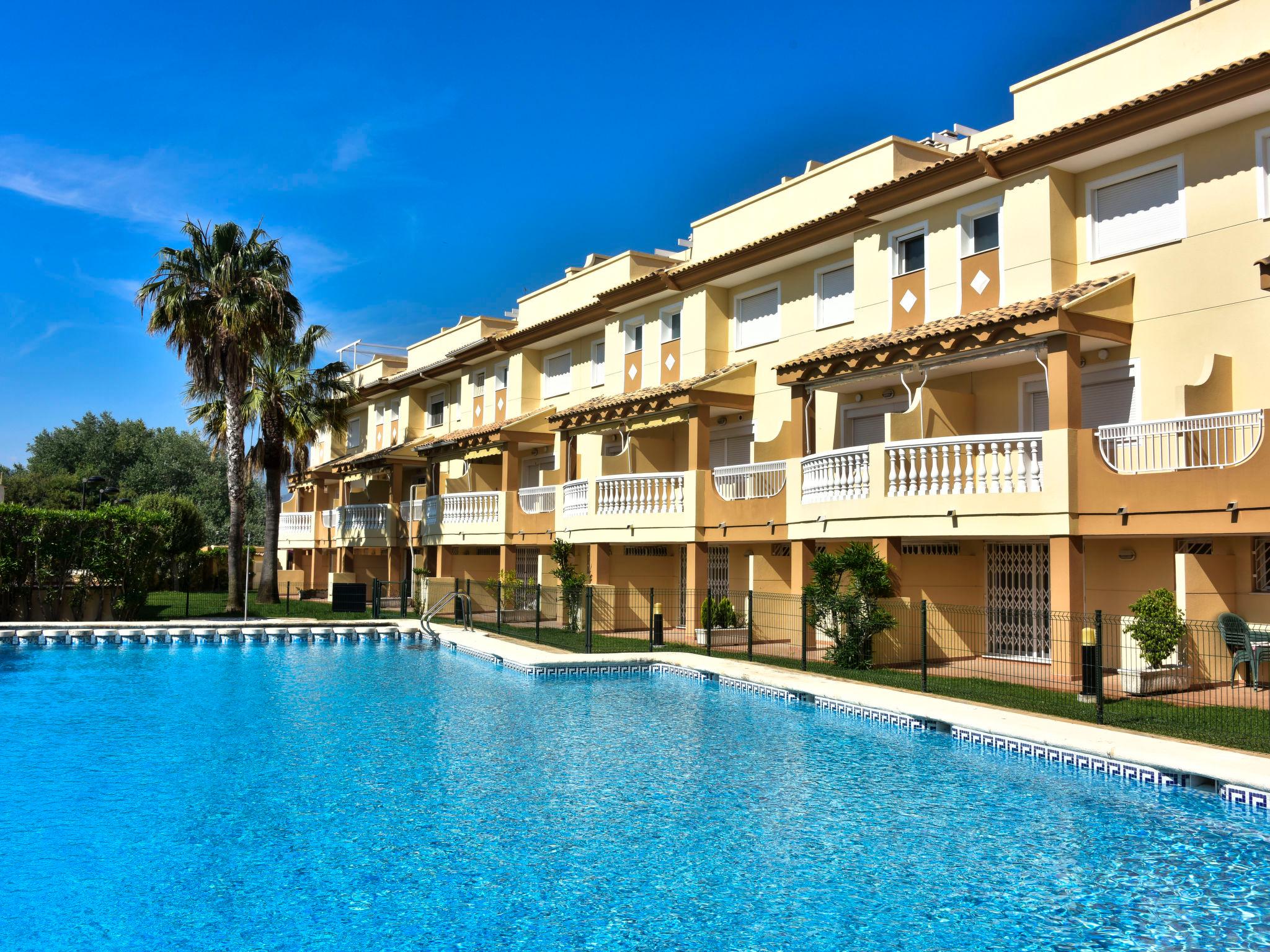 Photo 1 - Maison de 4 chambres à Oliva avec piscine et vues à la mer