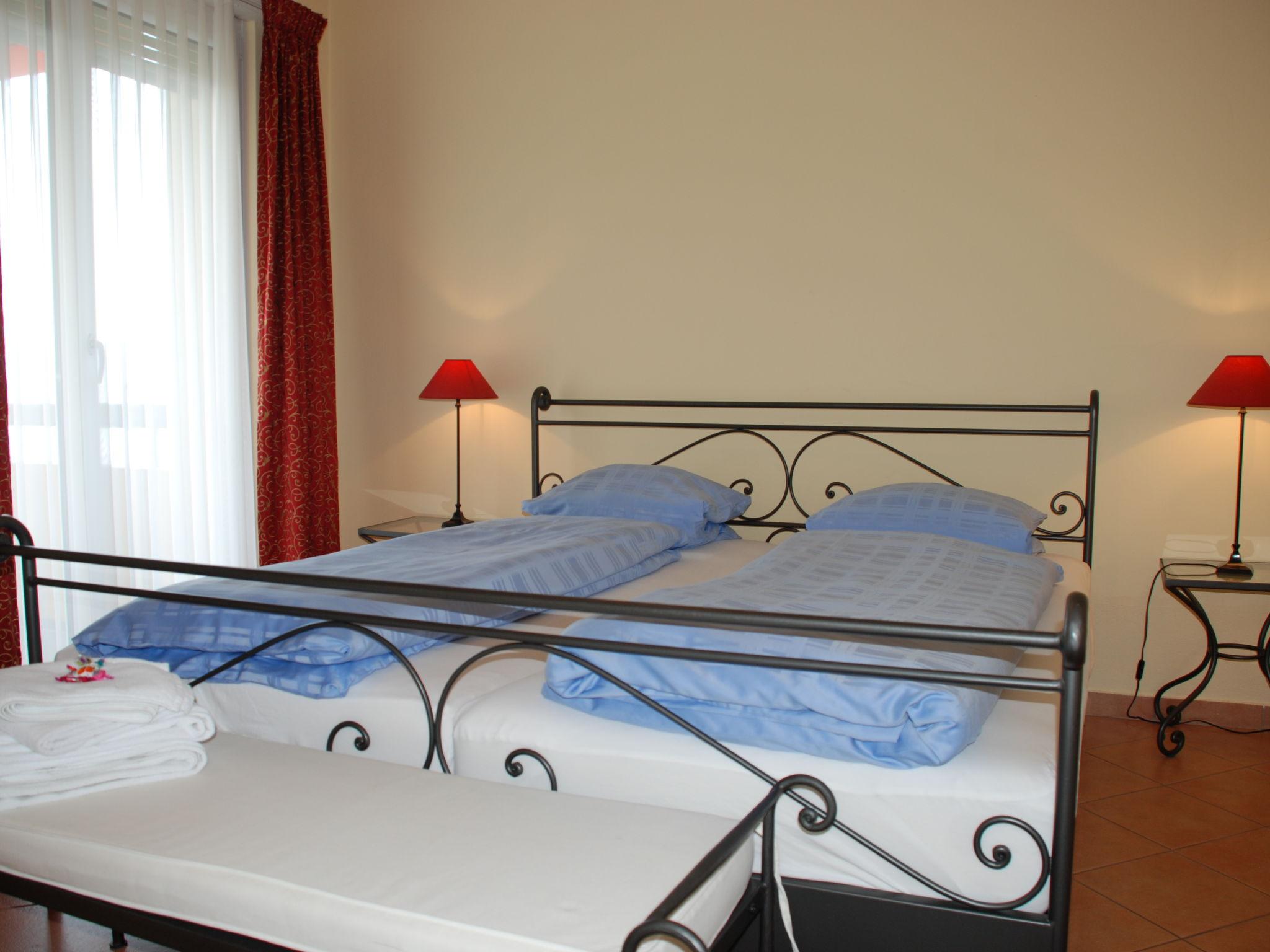 Foto 4 - Appartamento con 2 camere da letto a Lugano con piscina e vista sulle montagne