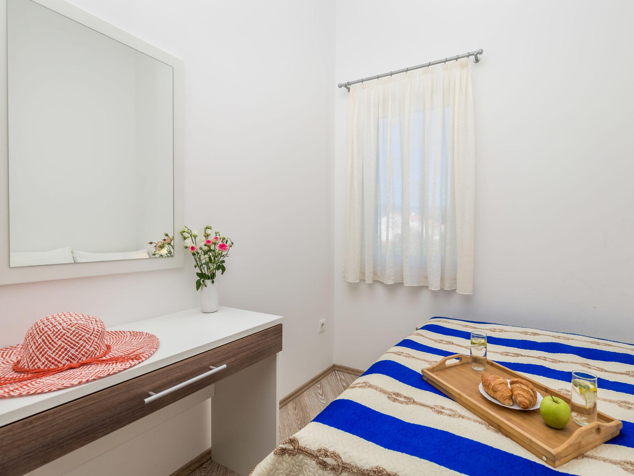 Photo 13 - Appartement de 2 chambres à Dobrinj avec piscine et vues à la mer