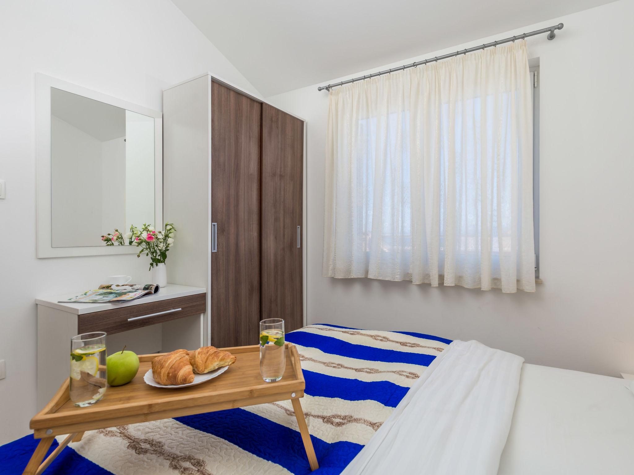 Photo 11 - Appartement de 2 chambres à Dobrinj avec piscine et vues à la mer