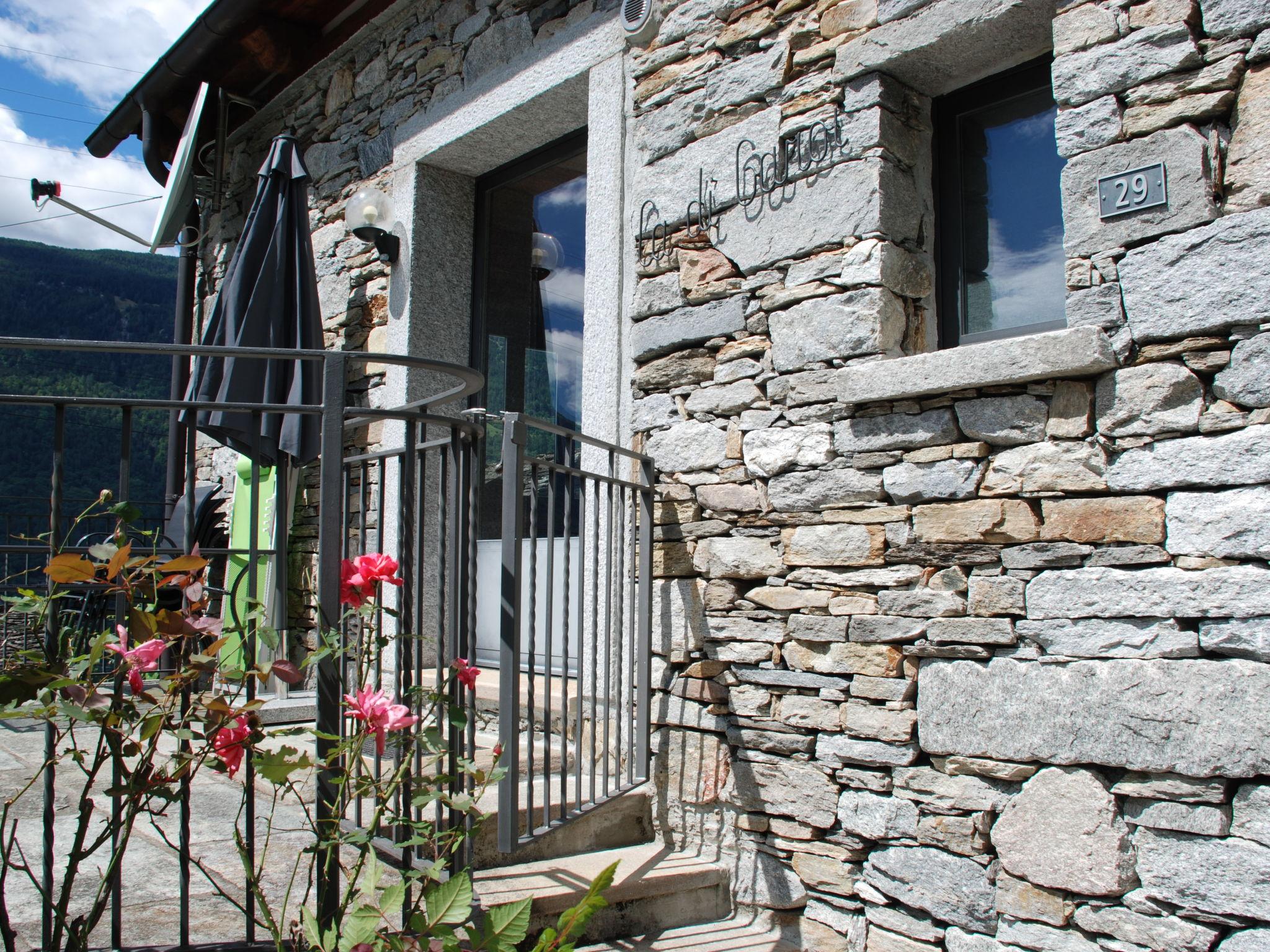 Photo 11 - Maison de 1 chambre à Serravalle avec jardin et vues sur la montagne