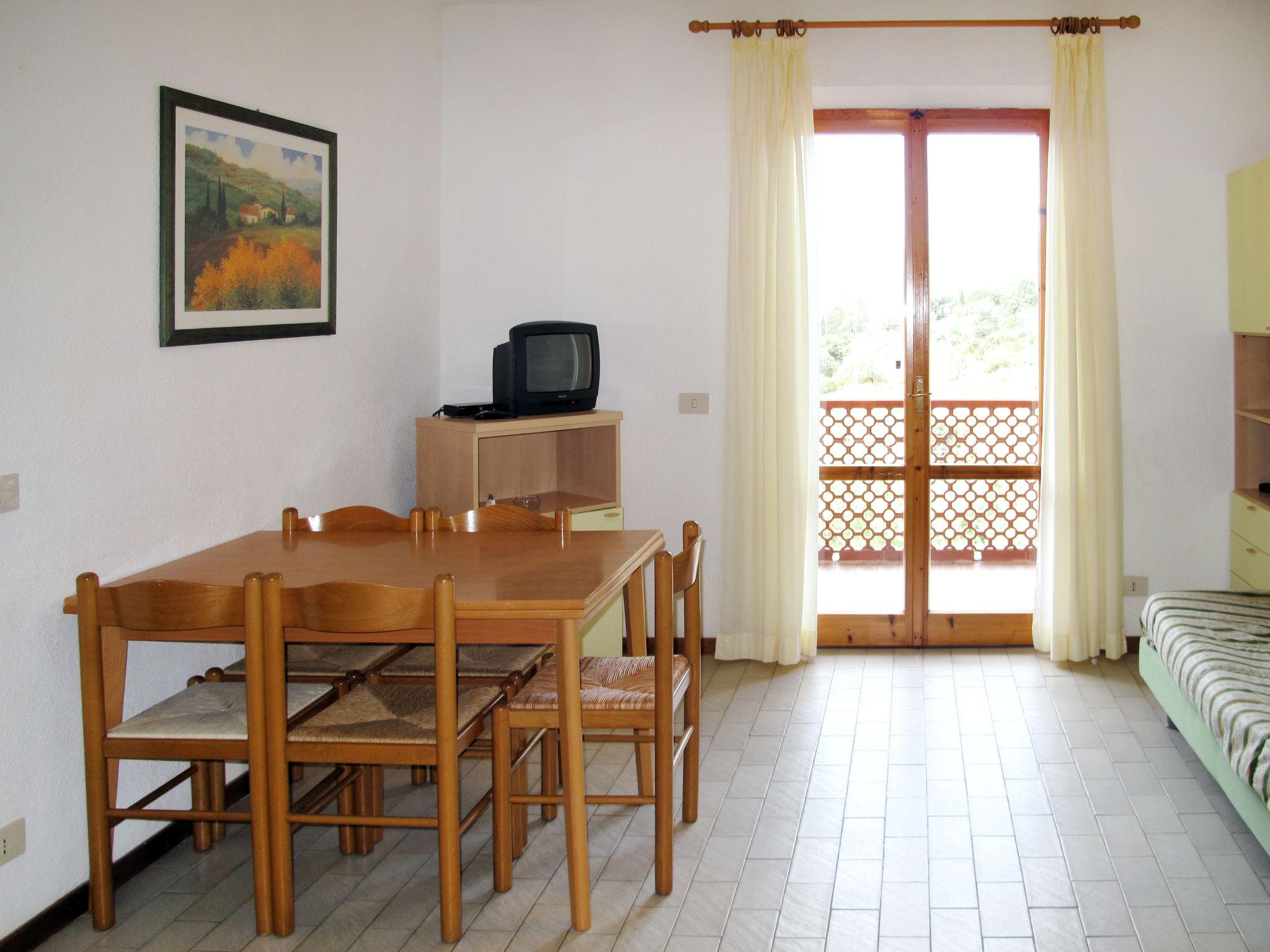 Photo 12 - Appartement de 2 chambres à Capoliveri avec jardin et vues à la mer