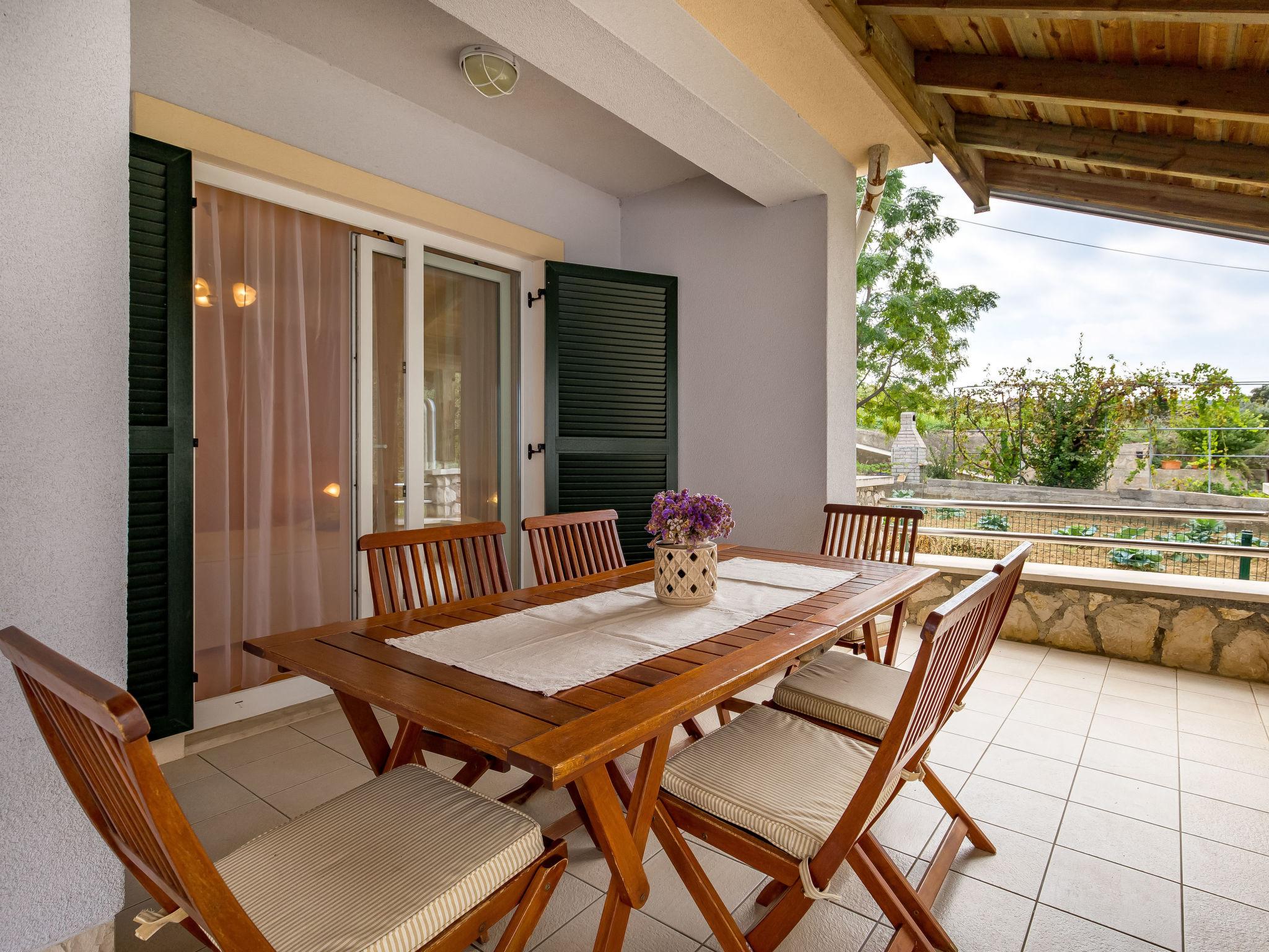 Photo 2 - Maison de 2 chambres à Rab avec piscine et vues à la mer