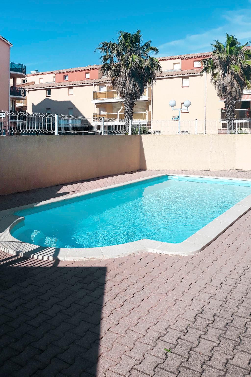 Foto 1 - Appartamento con 1 camera da letto a Sainte-Marie-la-Mer con piscina privata e vista mare