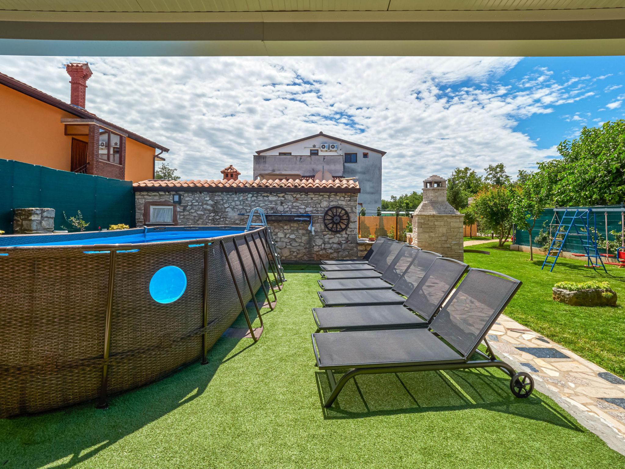 Photo 12 - Maison de 4 chambres à Umag avec piscine privée et jardin