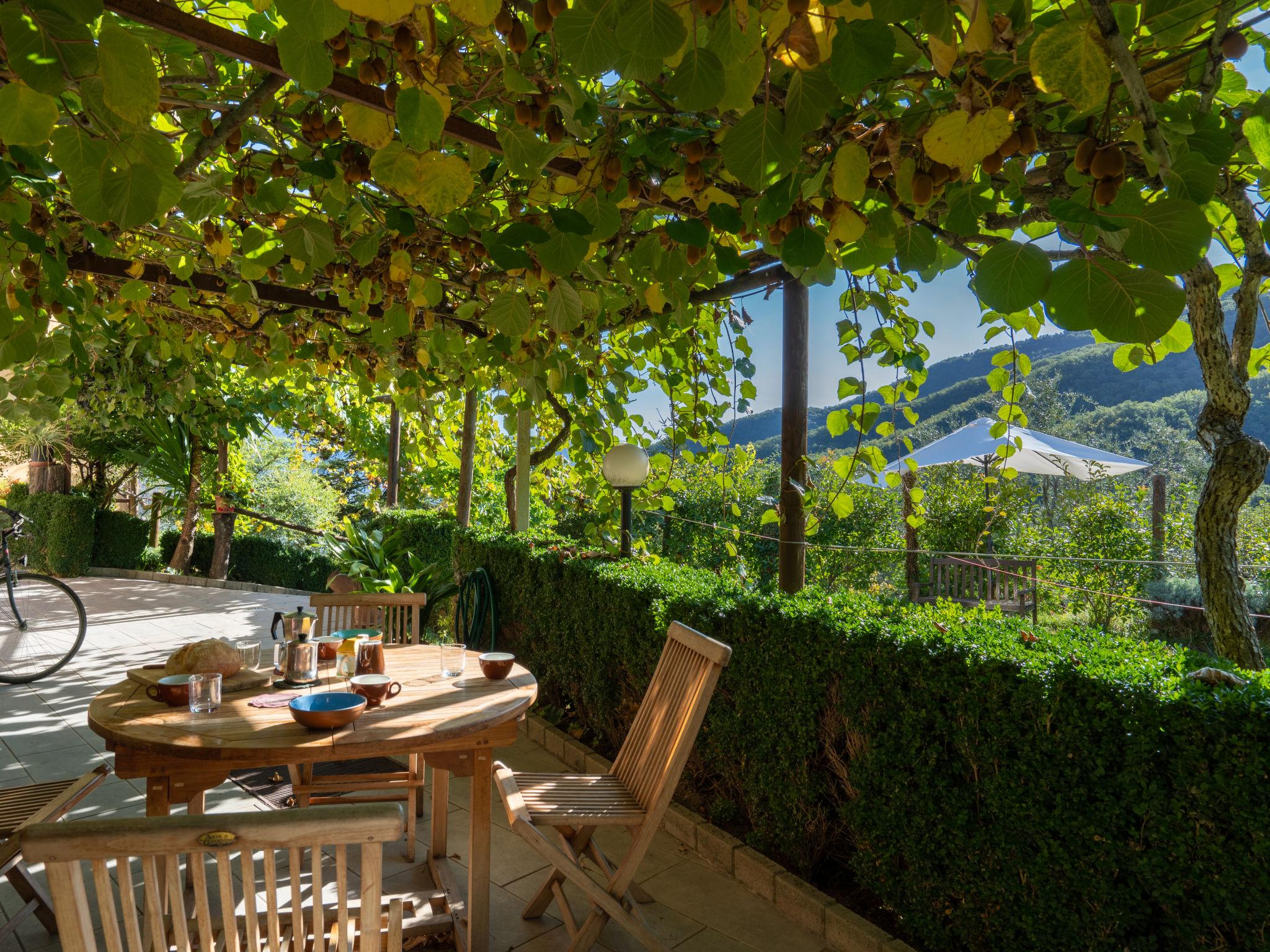 Photo 2 - Maison de 1 chambre à Borgomaro avec piscine privée et jardin