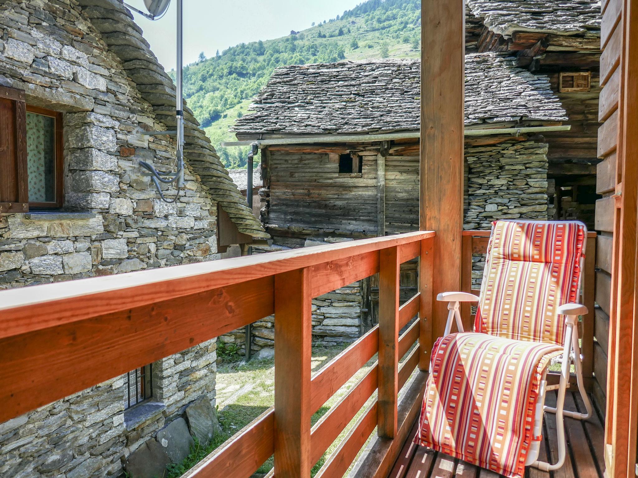 Photo 5 - Maison de 2 chambres à Serravalle avec jardin et vues sur la montagne