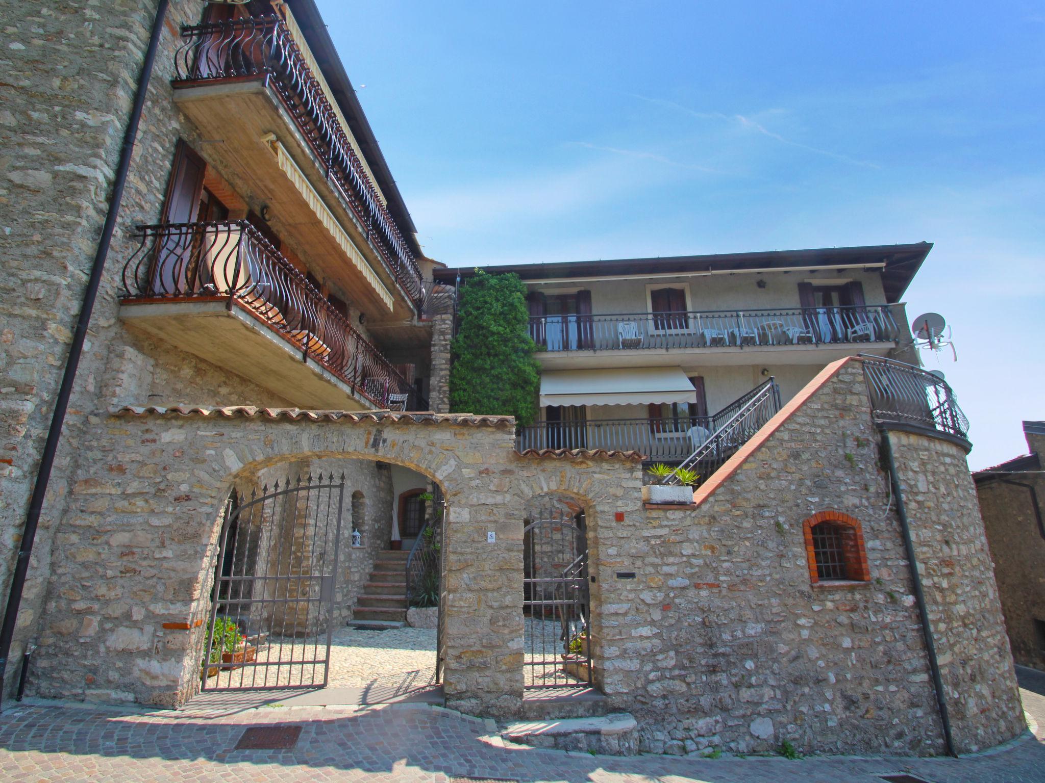 Foto 1 - Apartamento de 2 quartos em Tignale com terraço e vista para a montanha