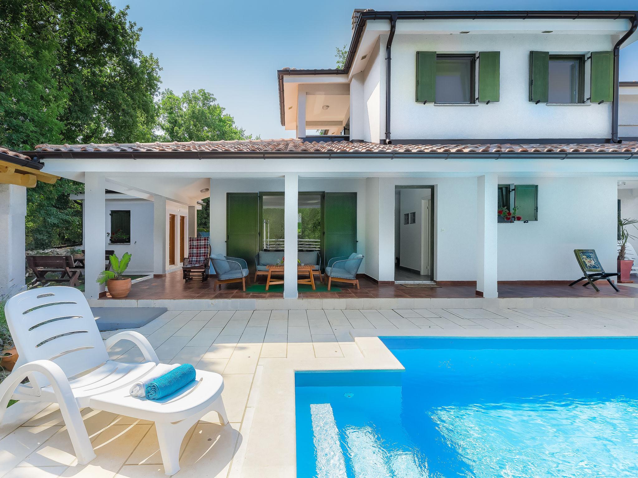 Photo 2 - Maison de 3 chambres à Umag avec piscine privée et vues à la mer