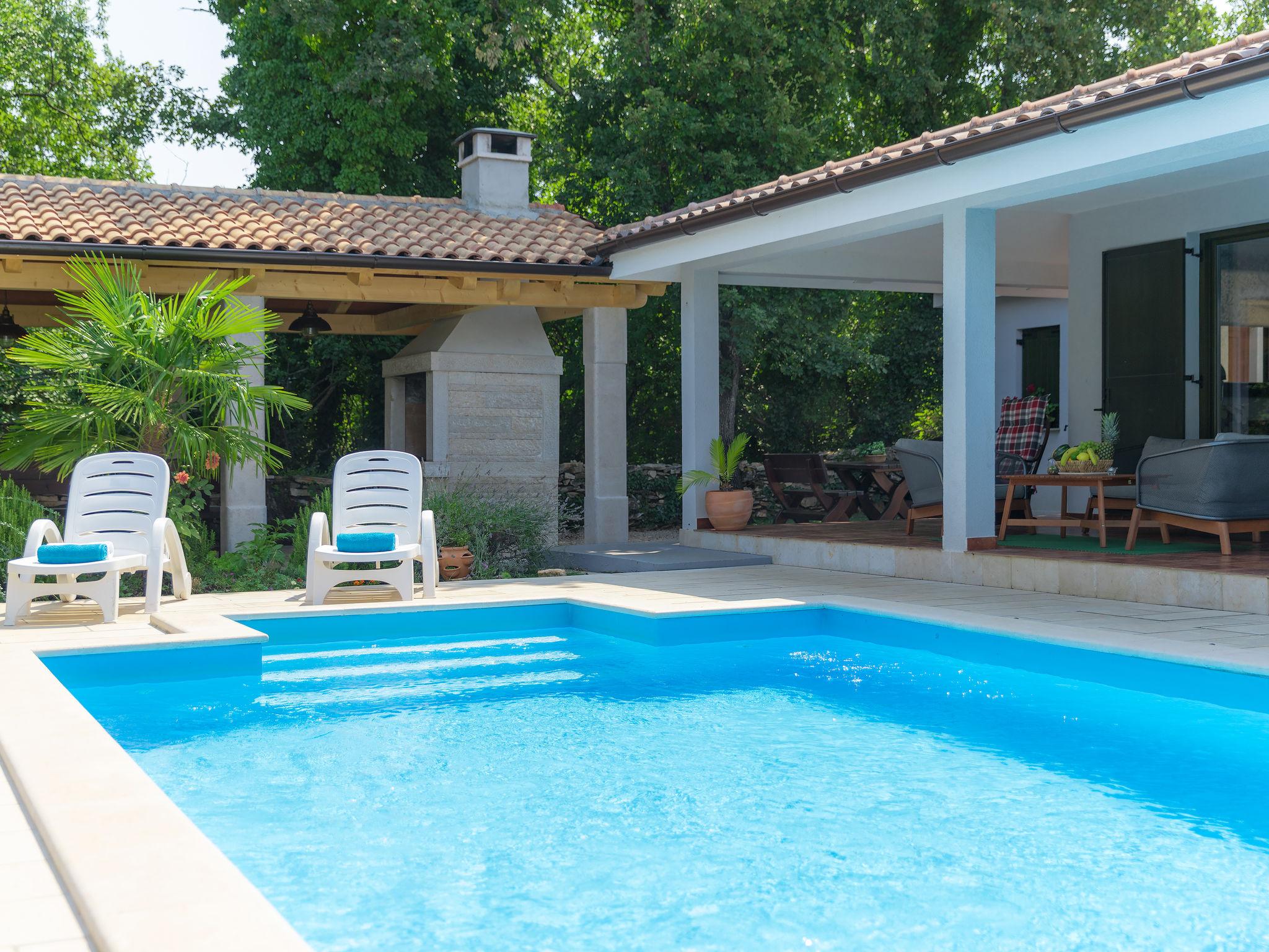 Foto 20 - Casa de 3 quartos em Umag com piscina privada e vistas do mar