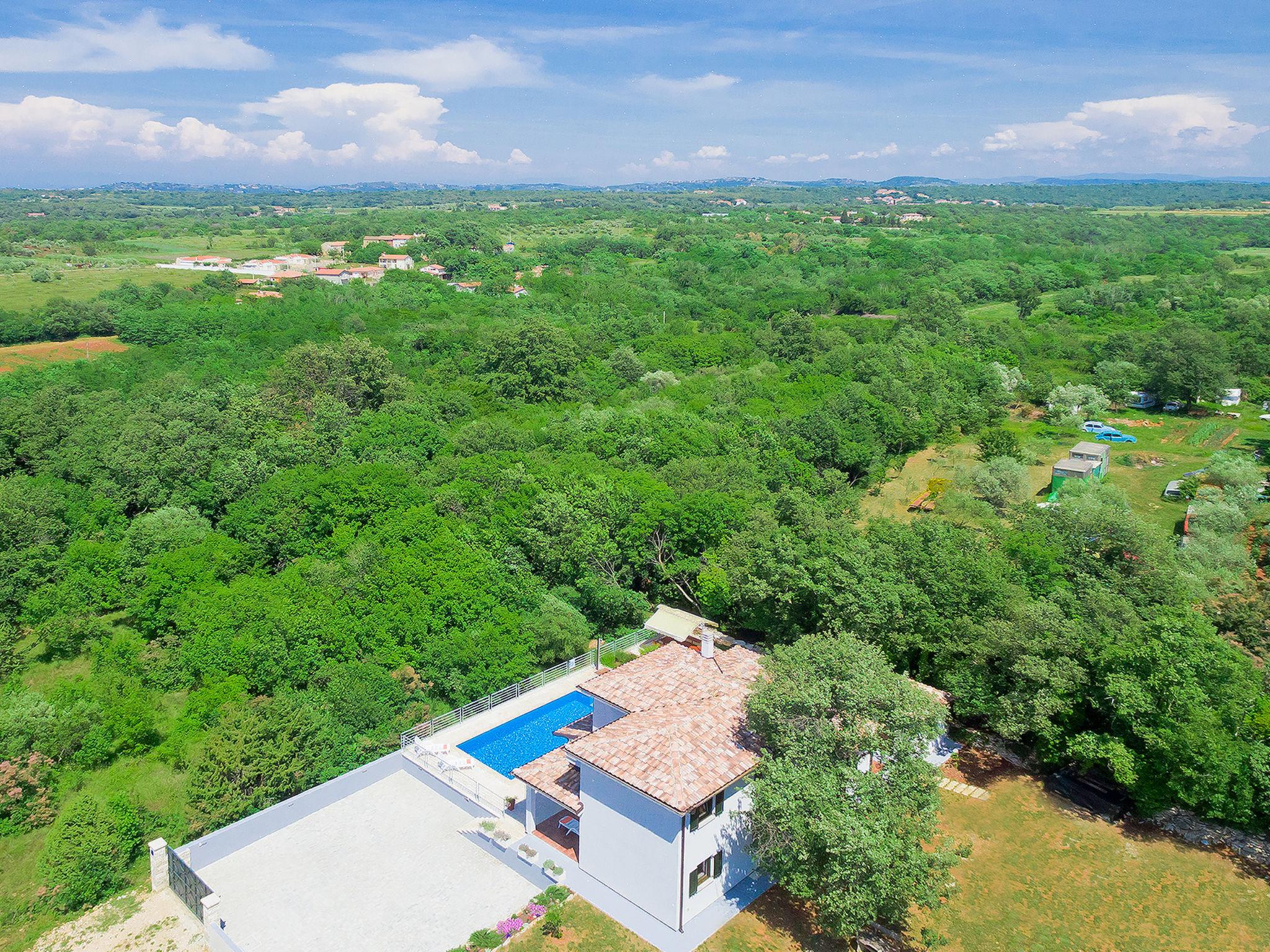 Foto 41 - Casa con 3 camere da letto a Umag con piscina privata e giardino