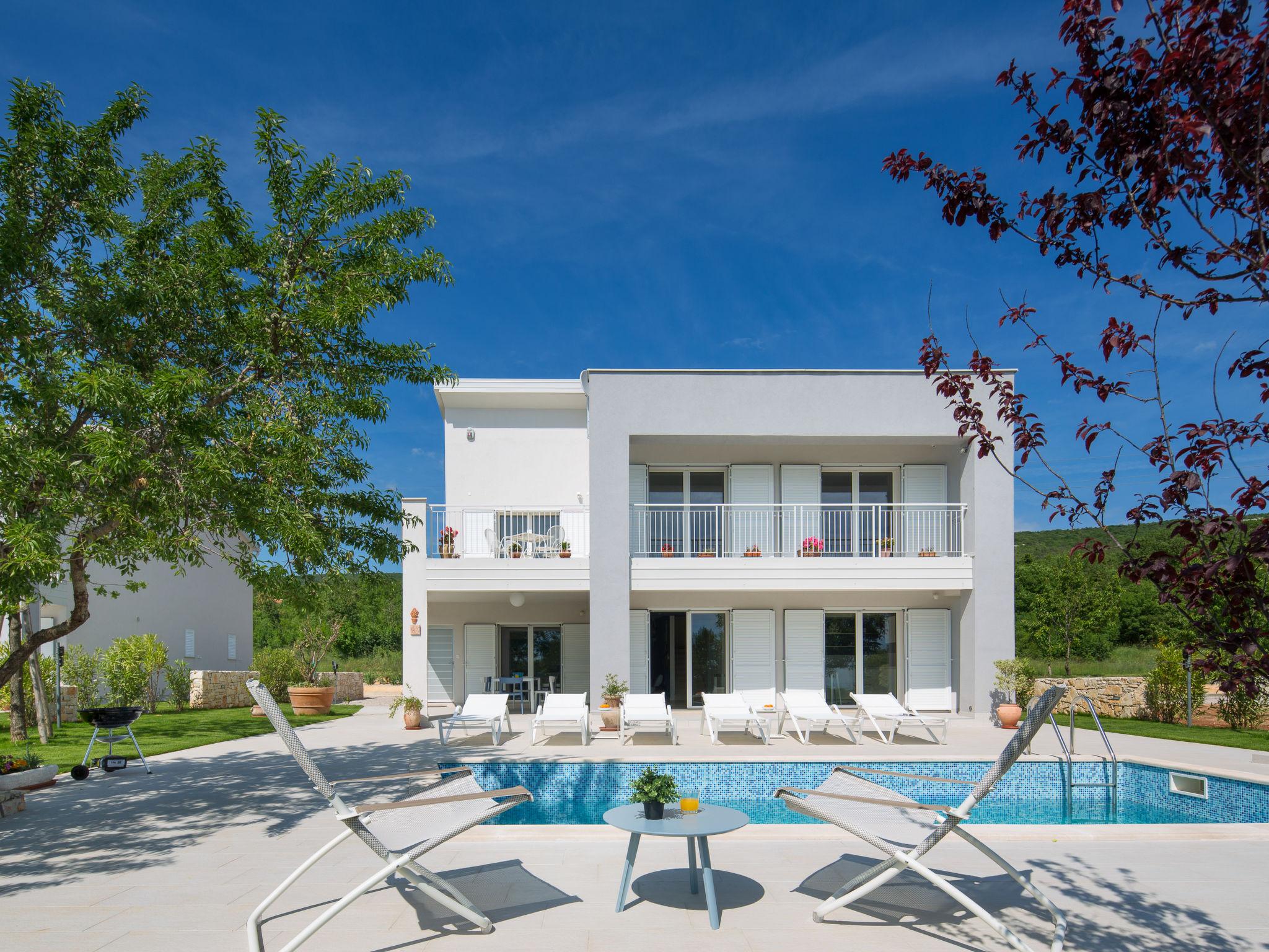 Photo 1 - Maison de 4 chambres à Raša avec piscine privée et vues à la mer