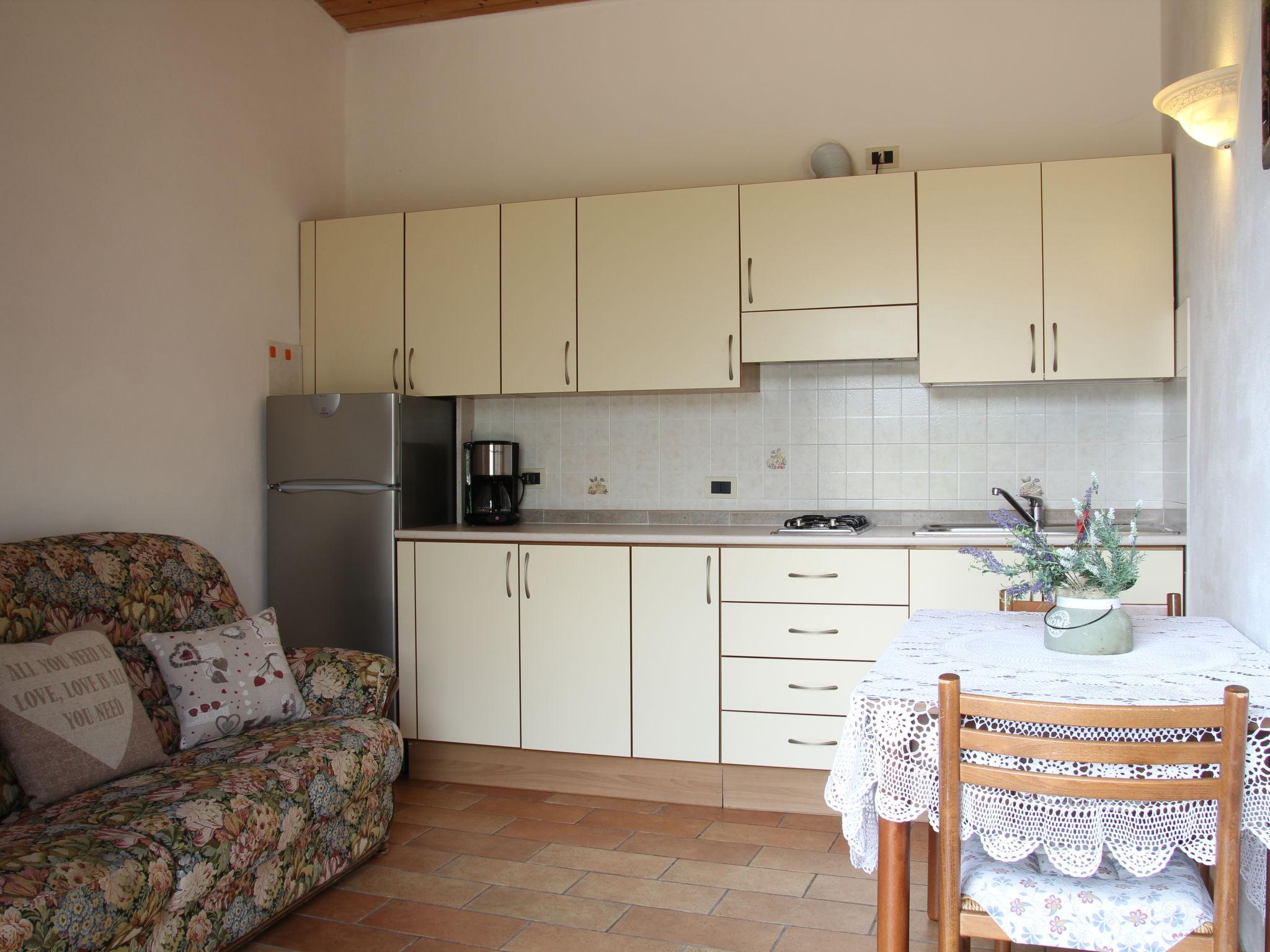 Foto 4 - Apartamento de 1 habitación en Tremosine sul Garda con piscina y jardín