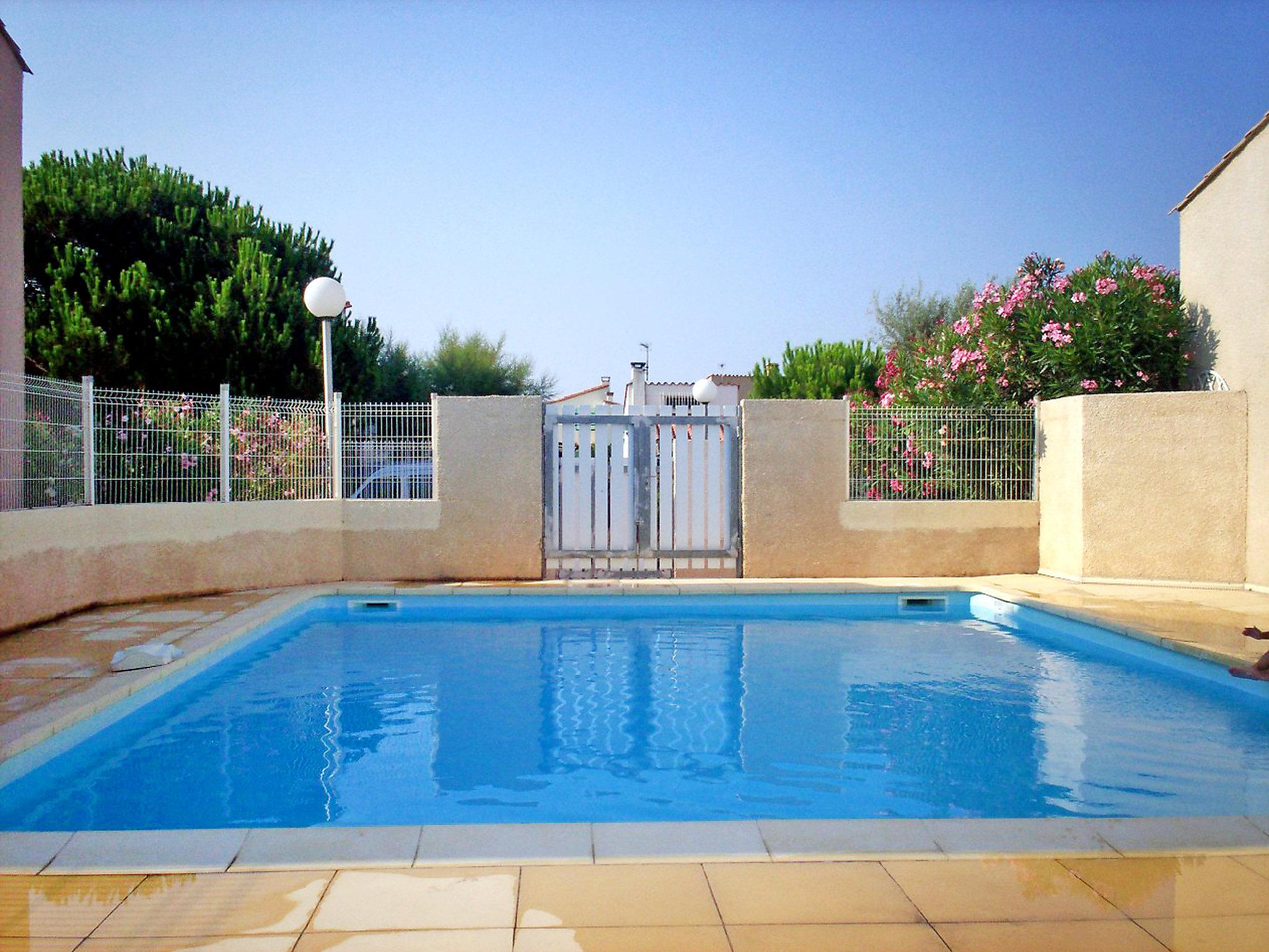 Foto 1 - Casa de 2 habitaciones en Le Barcarès con piscina y vistas al mar