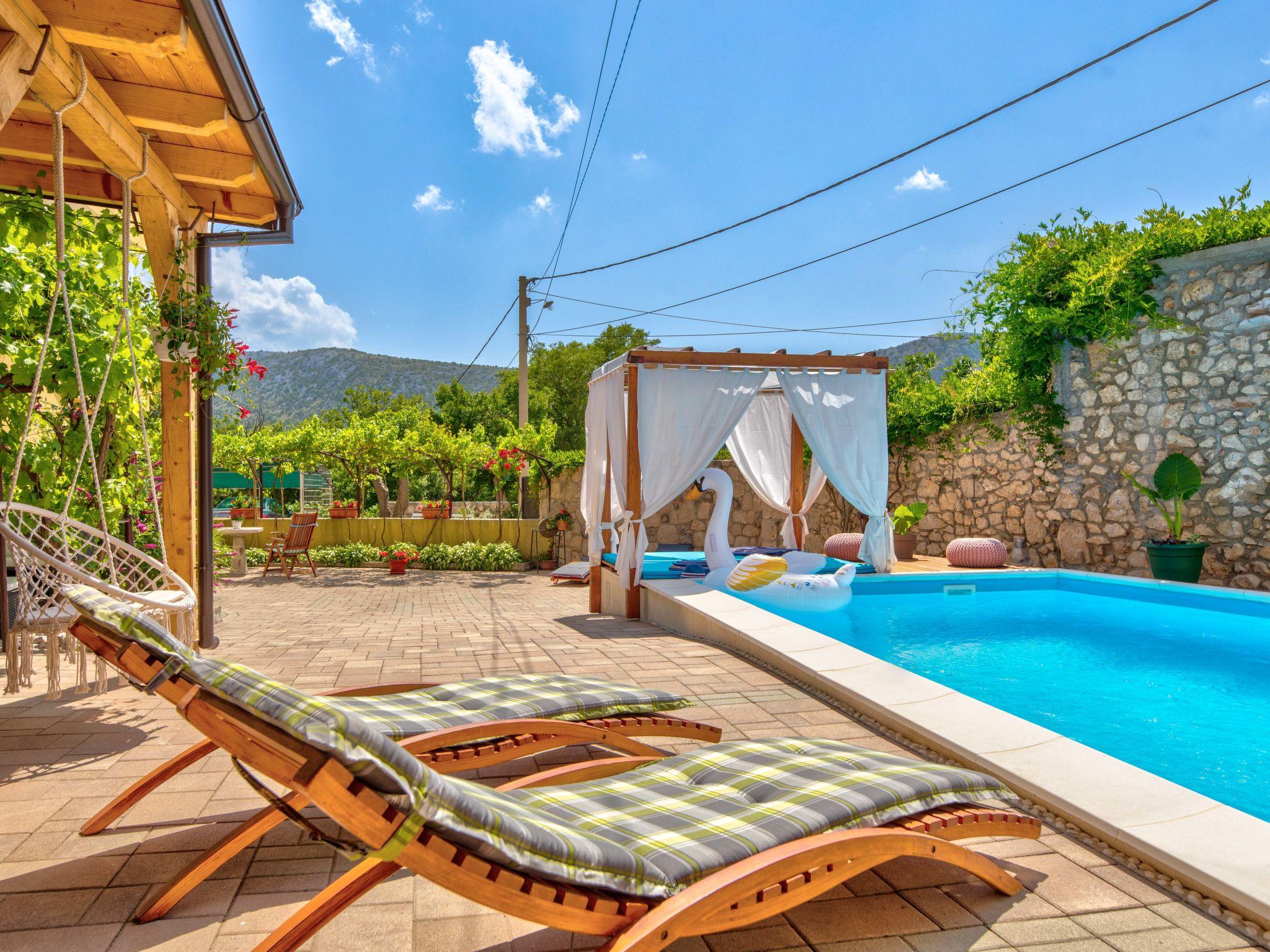 Photo 2 - Maison de 3 chambres à Vinodolska Općina avec piscine privée et vues à la mer