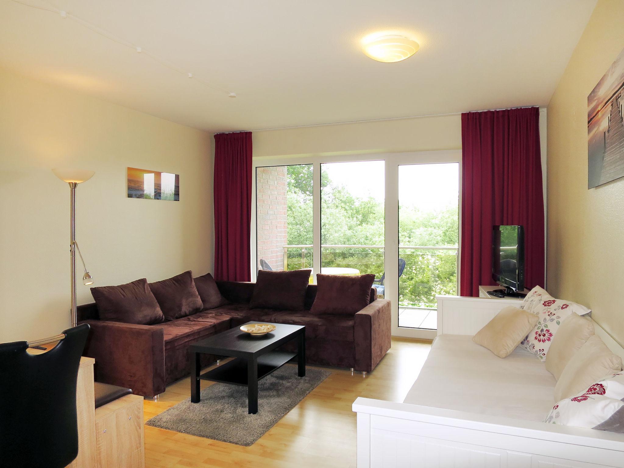 Foto 7 - Apartamento de 1 quarto em Wurster Nordseeküste com jardim e terraço