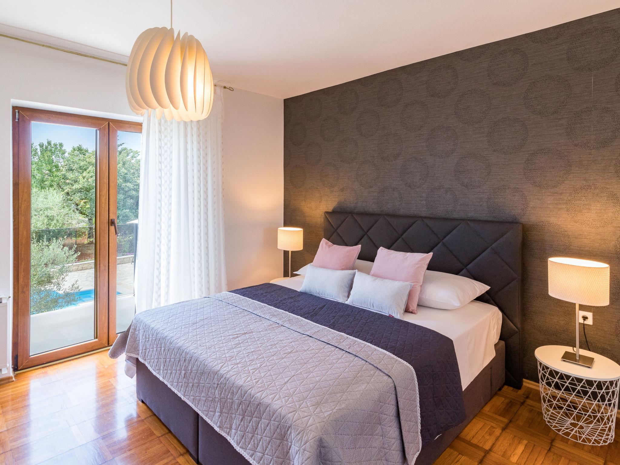 Foto 22 - Casa con 4 camere da letto a Kaštelir-Labinci con piscina privata e vista mare